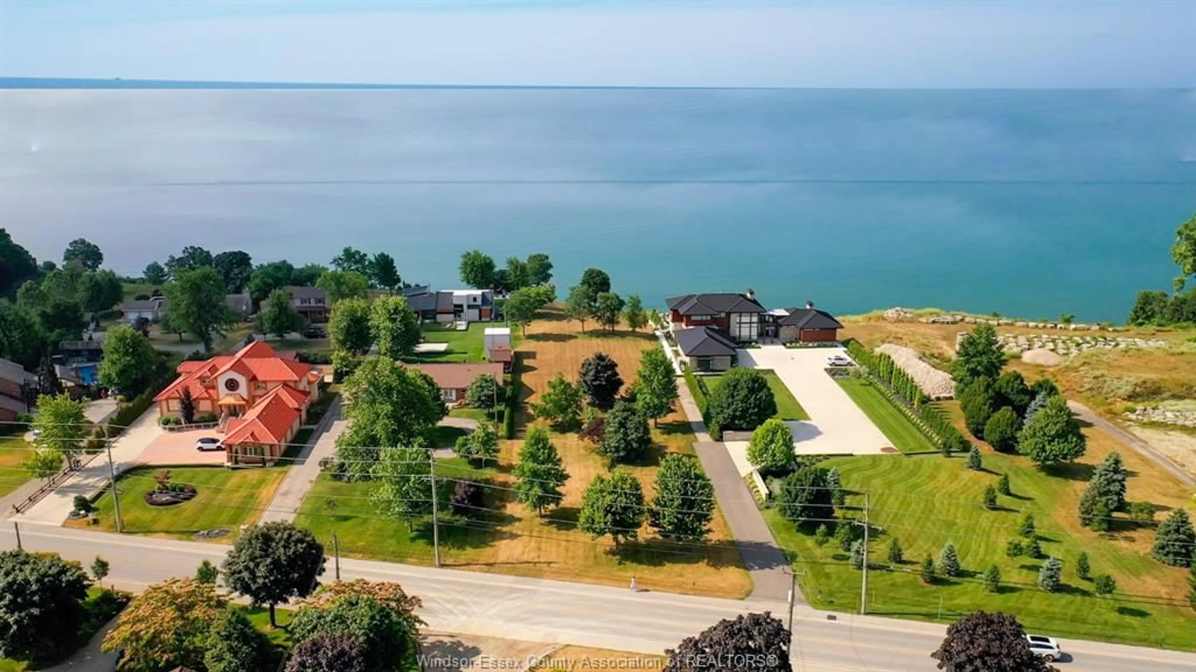 A pic from outside/outdoor area/front of a property/back of a property/a pic from drone, water/lake/river/ocean view for 366 SEACLIFF Dr, Leamington Ontario N8H 4E1