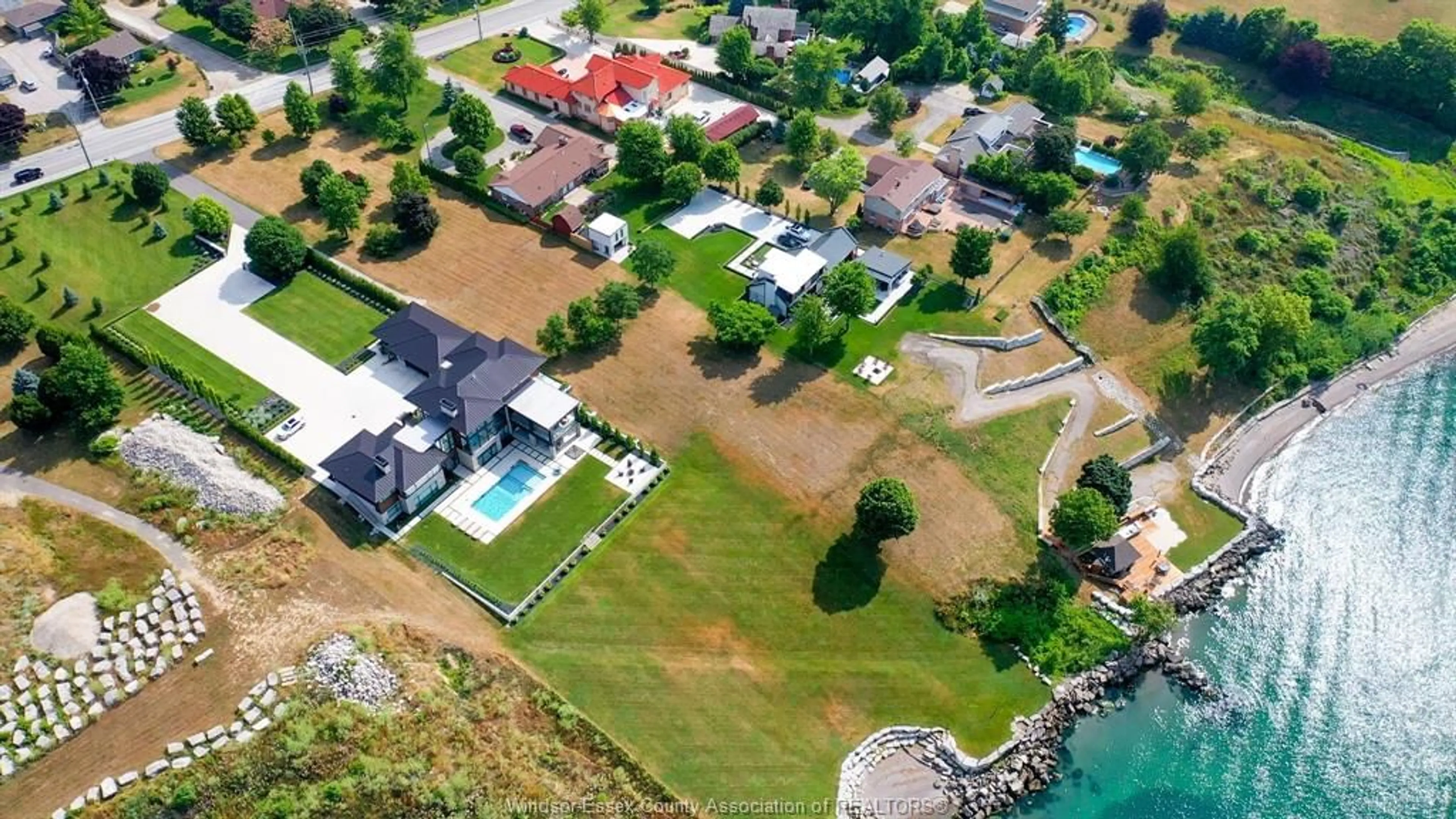 A pic from outside/outdoor area/front of a property/back of a property/a pic from drone, water/lake/river/ocean view for 366 SEACLIFF Dr, Leamington Ontario N8H 4E1