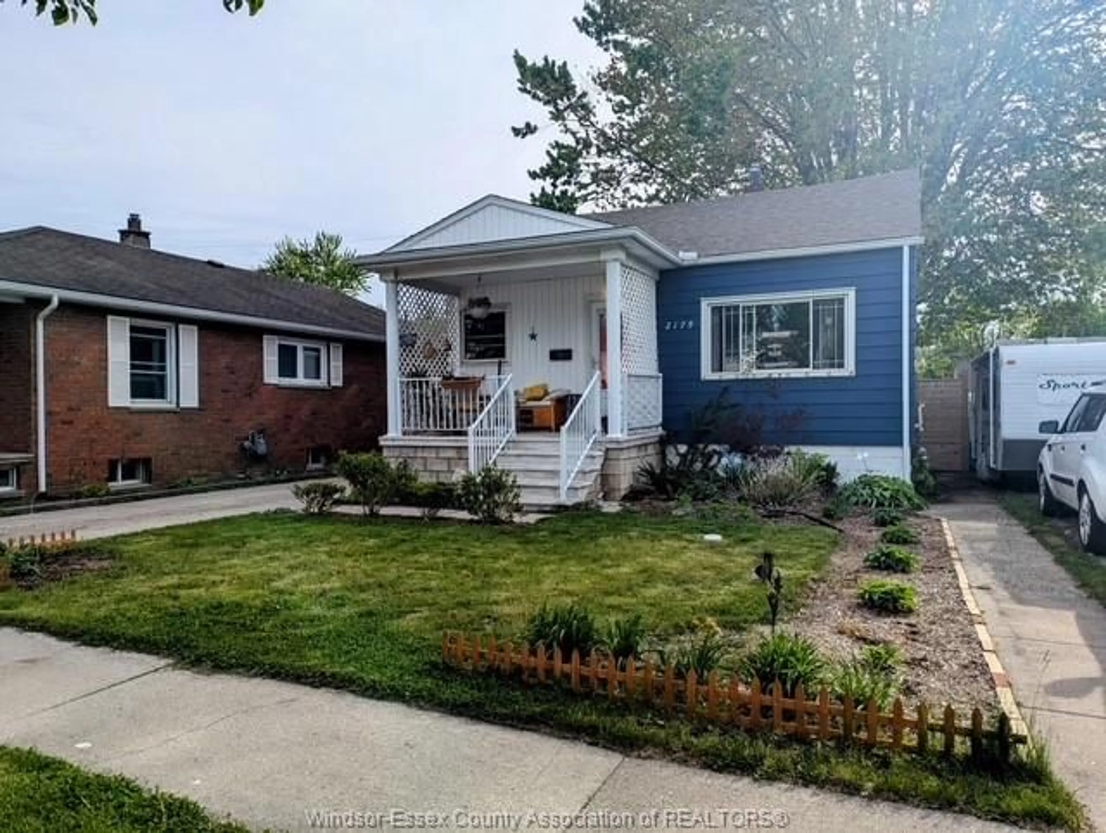 Home with vinyl exterior material, street for 2179 FOREST Ave, Windsor Ontario N8W 2G4