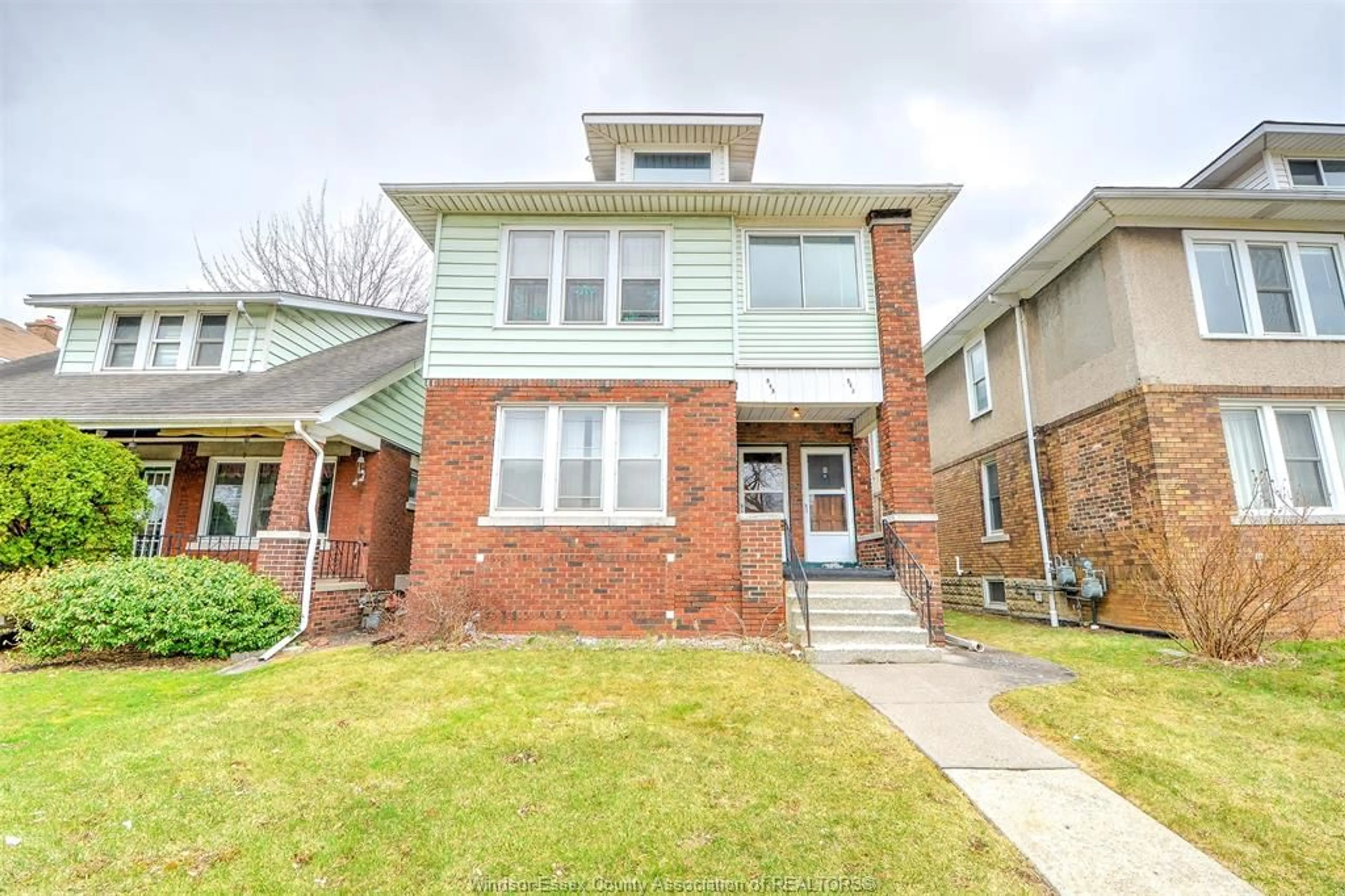 Home with brick exterior material, street for 543-545 GILES Blvd, Windsor Ontario N9A 4E1