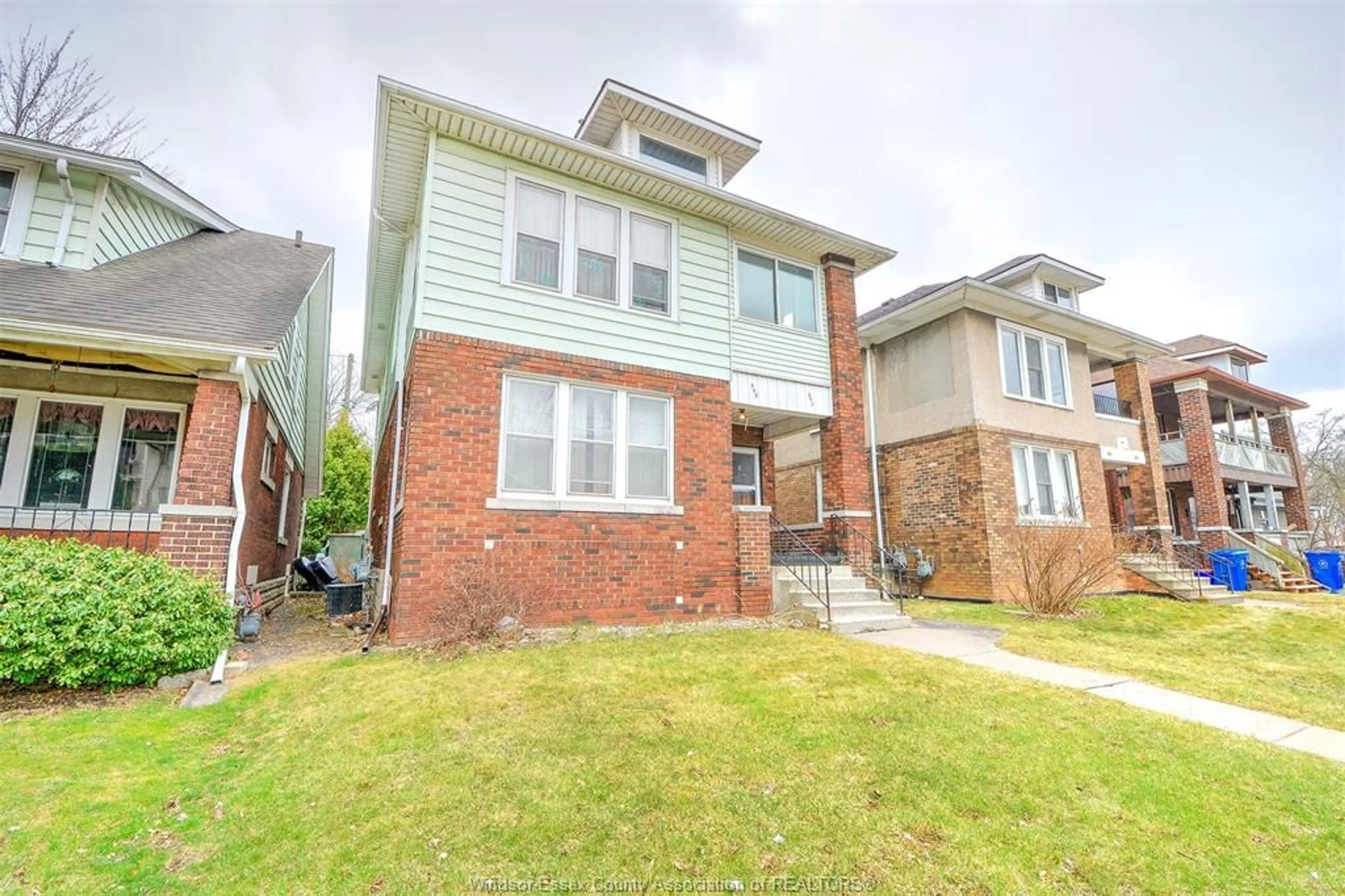Home with brick exterior material, street for 543-545 GILES Blvd, Windsor Ontario N9A 4E1
