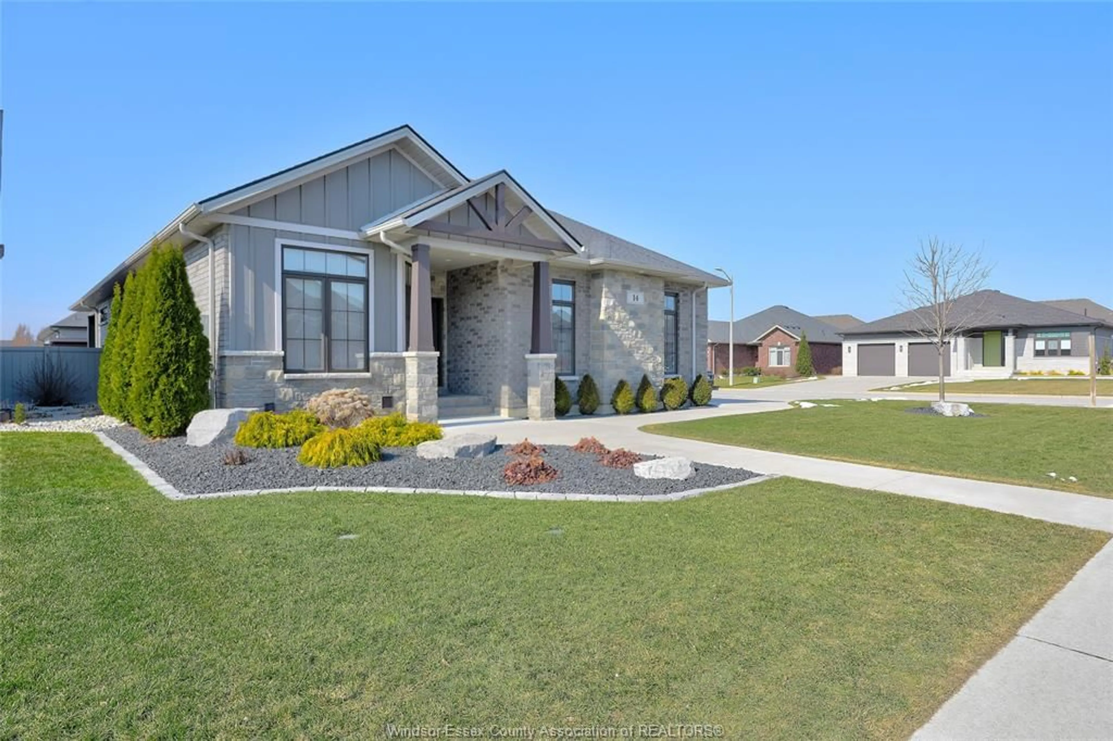 Home with brick exterior material, street for 14 LUKAS Dr, Kingsville Ontario N9Y 4G5