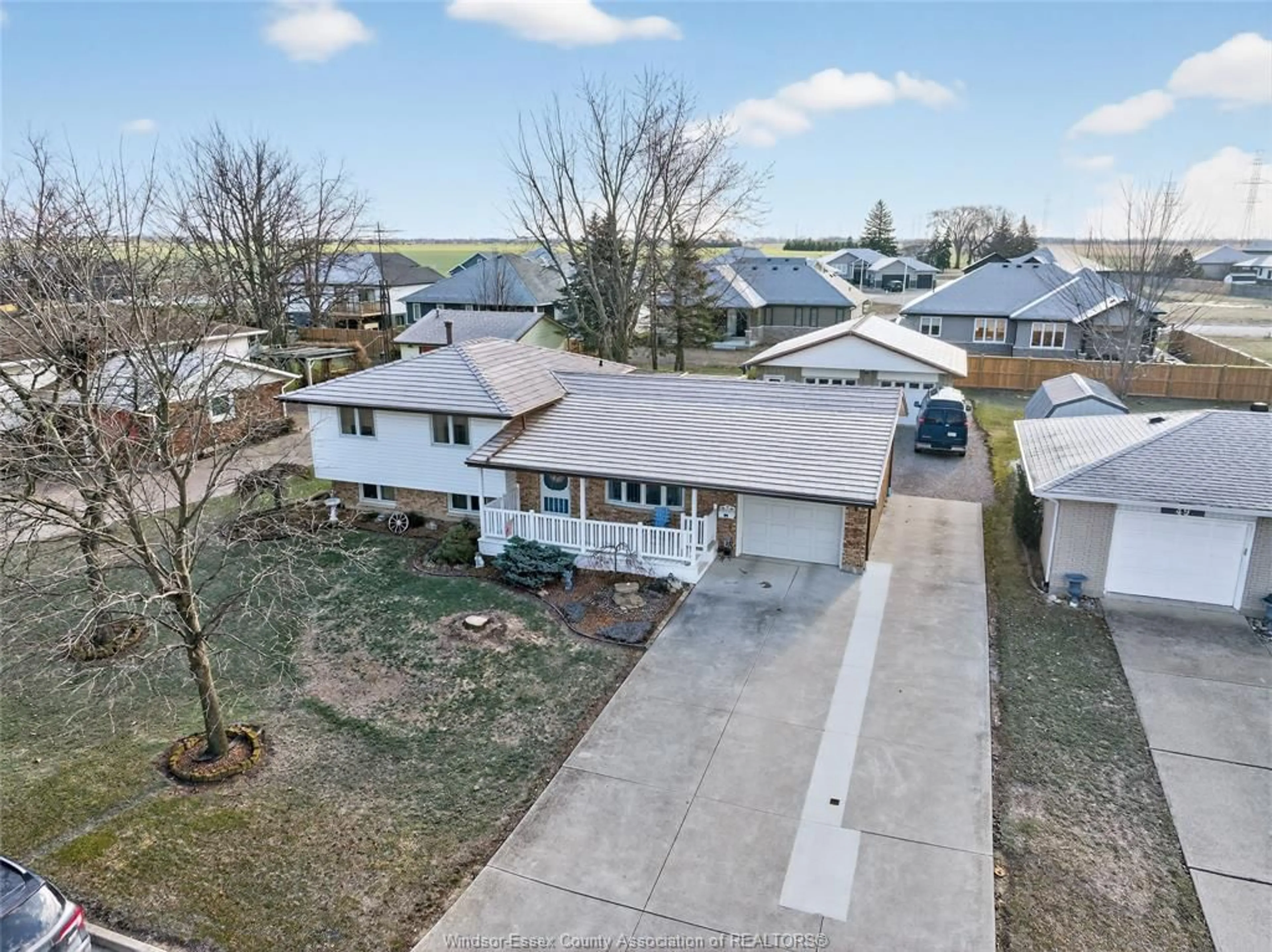 A pic from outside/outdoor area/front of a property/back of a property/a pic from drone, water/lake/river/ocean view for 47 Park Lane, Tilbury Ontario N0P 2L0