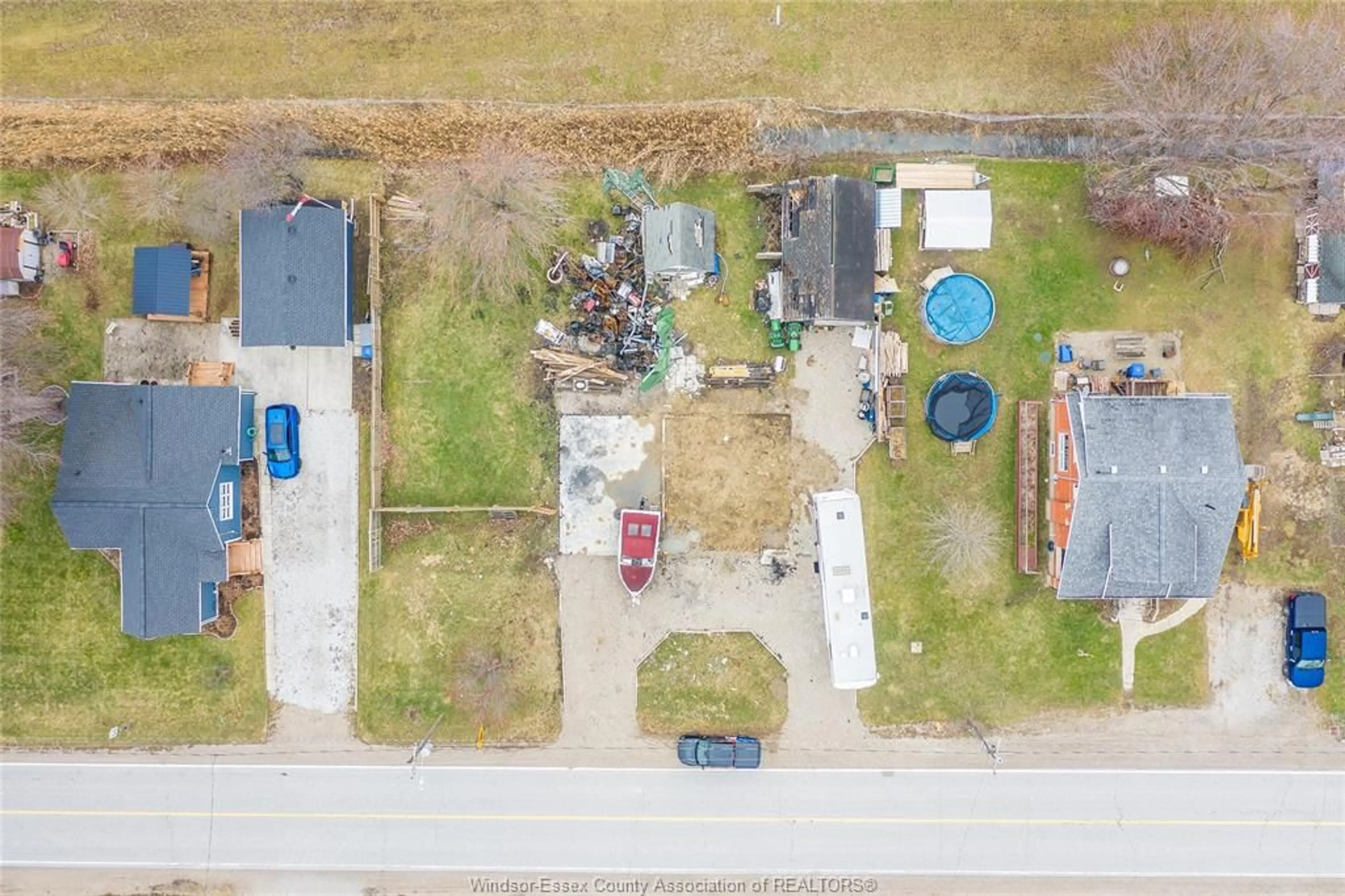 A pic from outside/outdoor area/front of a property/back of a property/a pic from drone, street for 2265 COUNTY RD 31, Lakeshore Ontario N0R 1R0