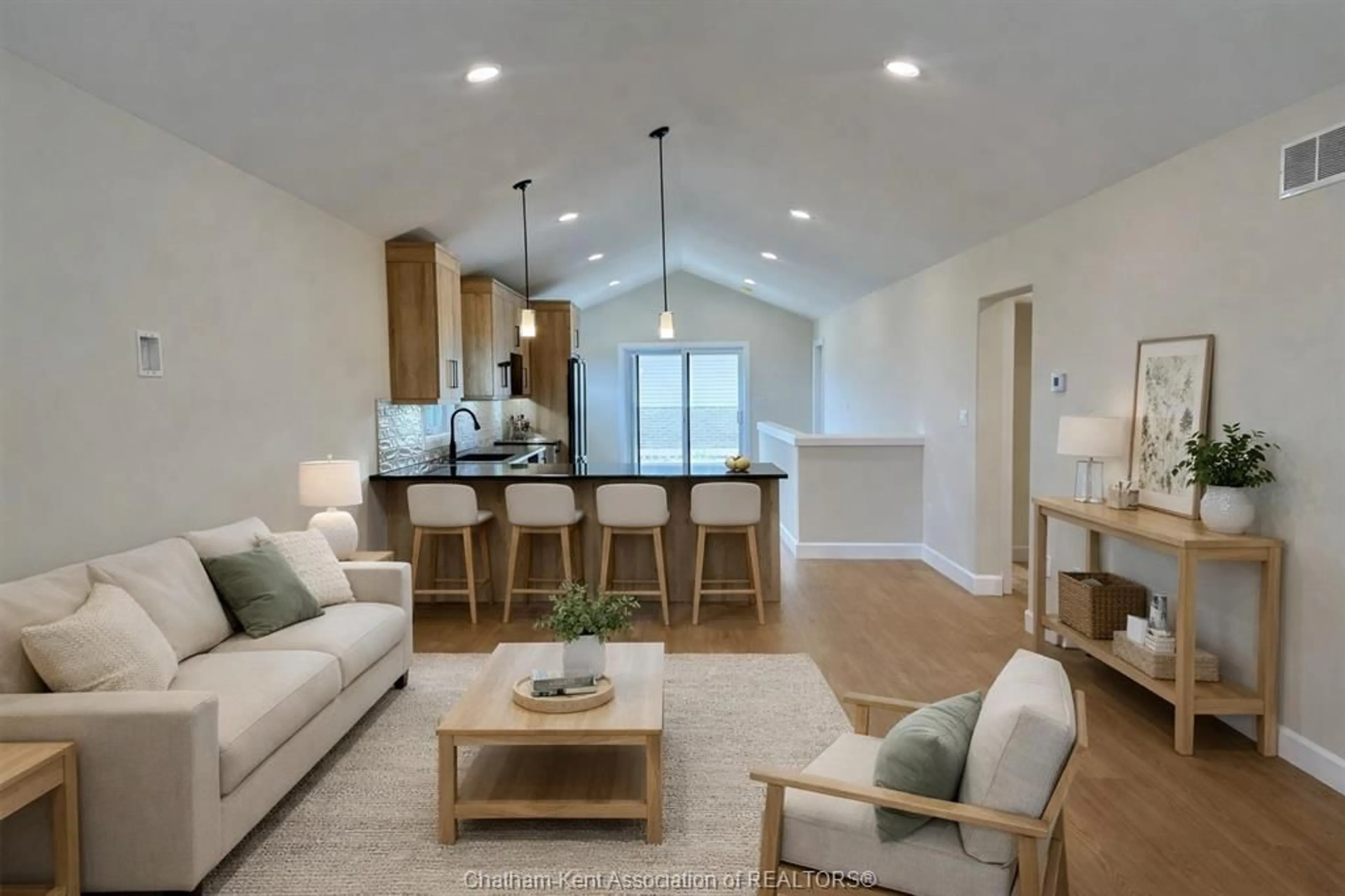 Living room with furniture, wood/laminate floor for 216 IRONWOOD Trail, Chatham Ontario N7M 0T3