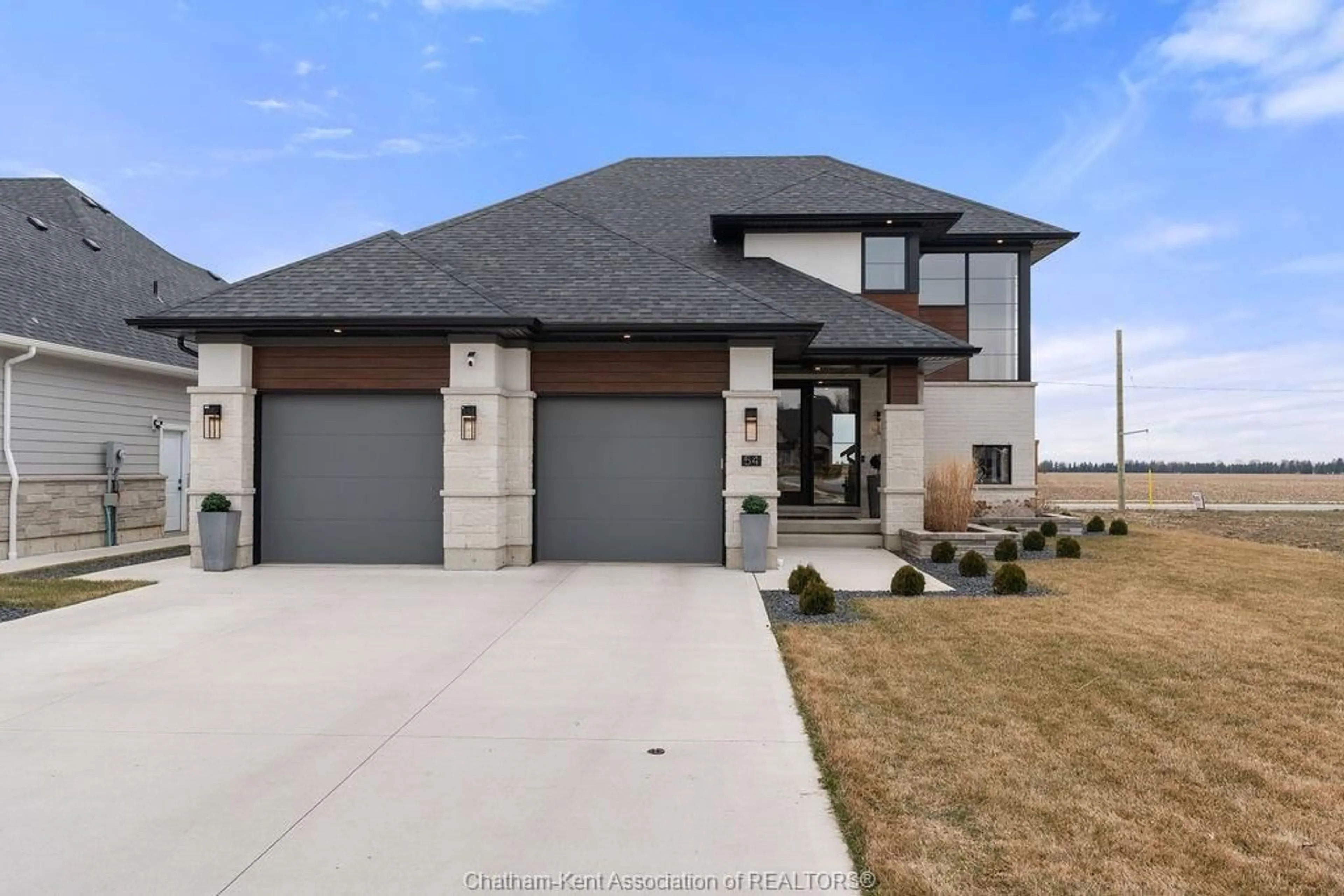 Home with brick exterior material, street for 54 Dundee Dr, Chatham Ontario N7M 0S7