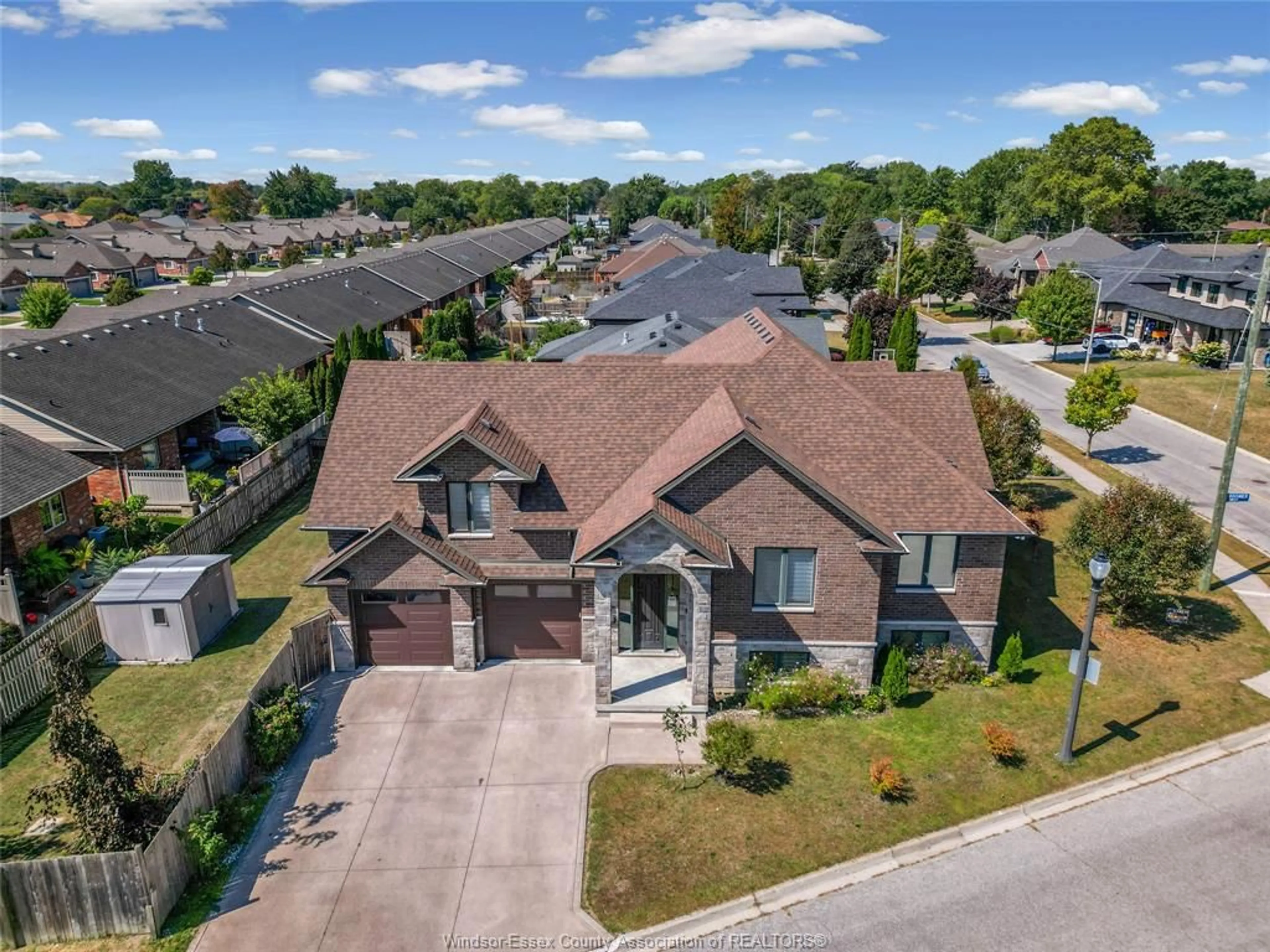 A pic from outside/outdoor area/front of a property/back of a property/a pic from drone, street for 498 SACRED HEART Dr, LaSalle Ontario N9J 0A6