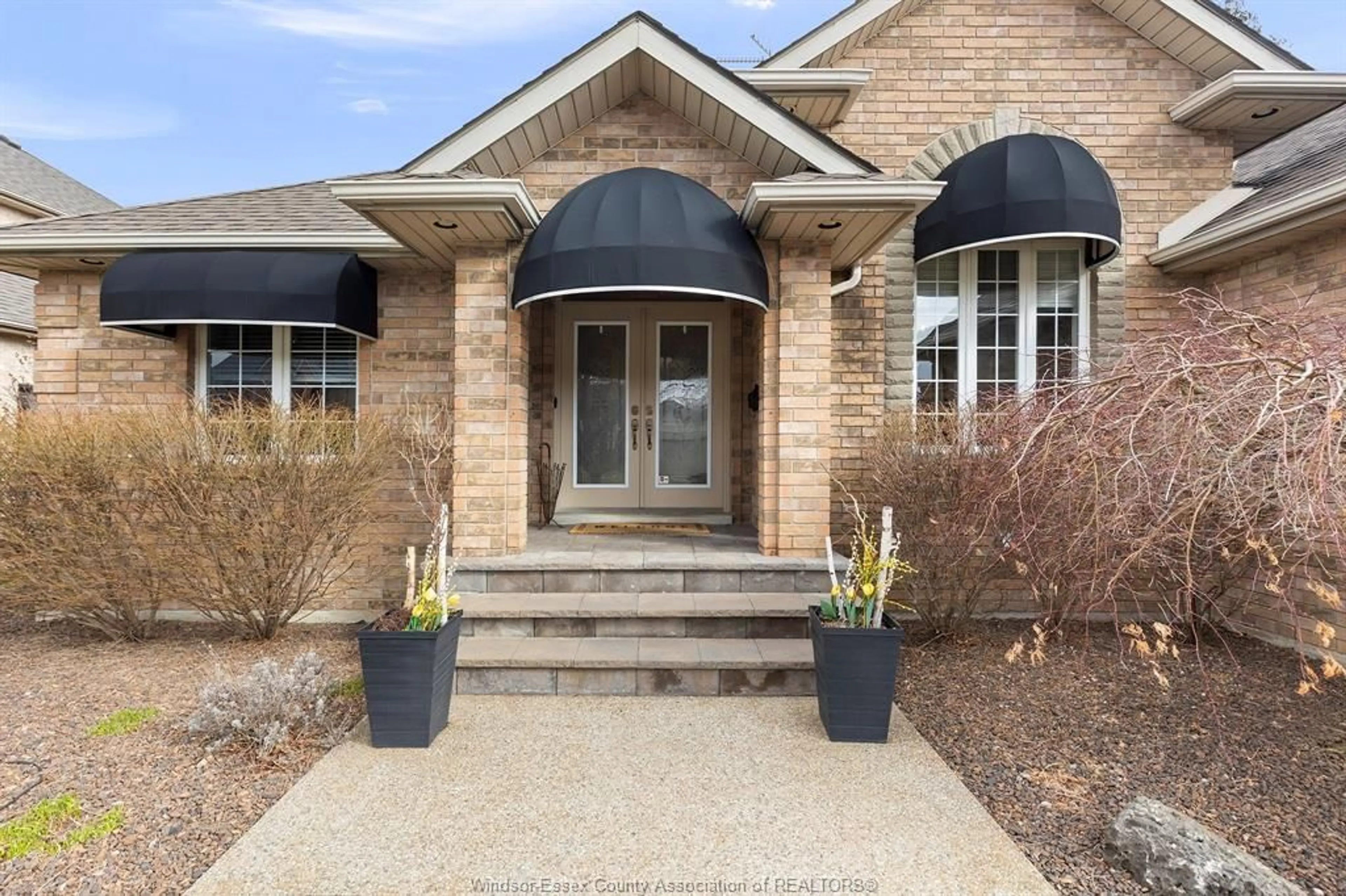 Home with brick exterior material, street for 606 GEORGE KENNEDY Way, Lakeshore Ontario N8L 0Z9