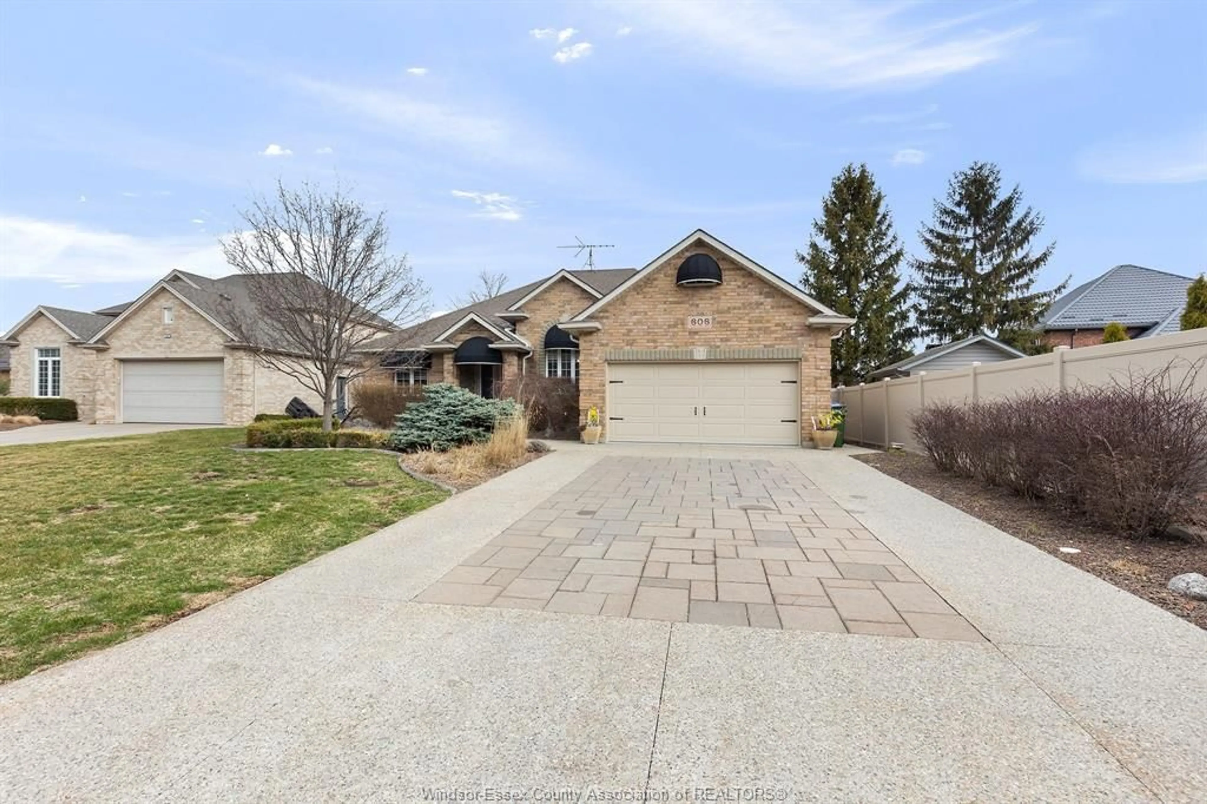 A pic from outside/outdoor area/front of a property/back of a property/a pic from drone, street for 606 GEORGE KENNEDY Way, Lakeshore Ontario N8L 0Z9