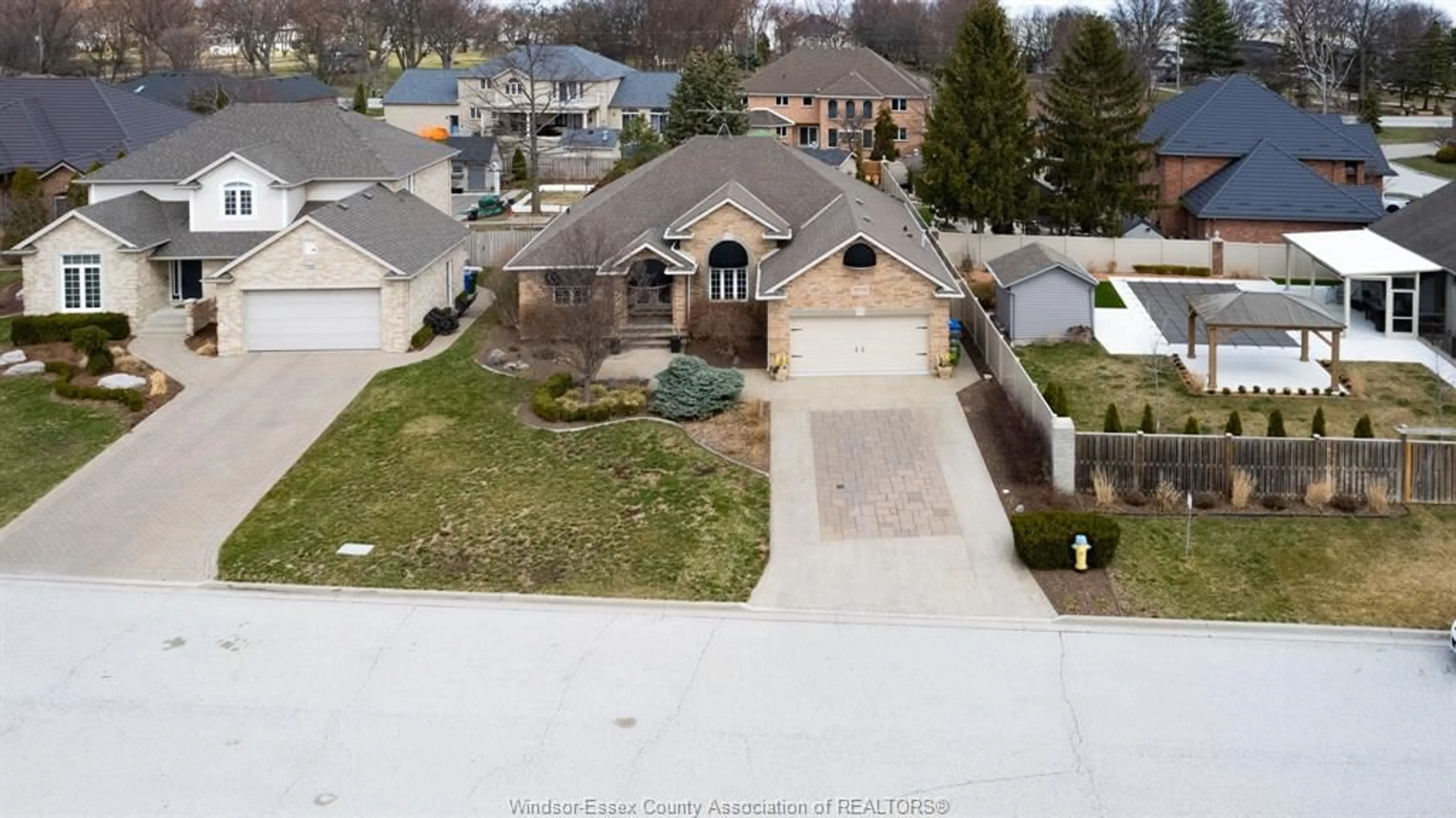 A pic from outside/outdoor area/front of a property/back of a property/a pic from drone, street for 606 GEORGE KENNEDY Way, Lakeshore Ontario N8L 0Z9