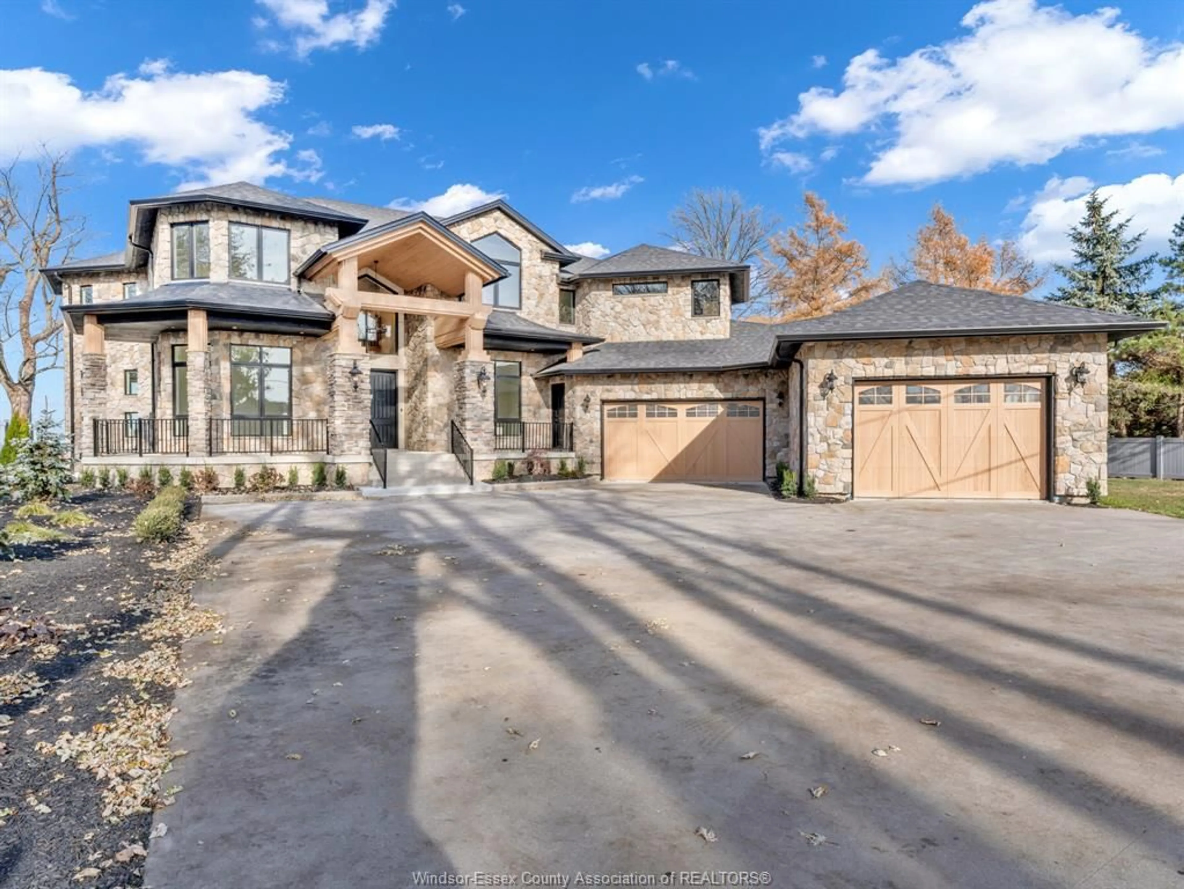 Home with brick exterior material, street for 720 OLD TECUMSEH Rd, Lakeshore Ontario N0R 1A0