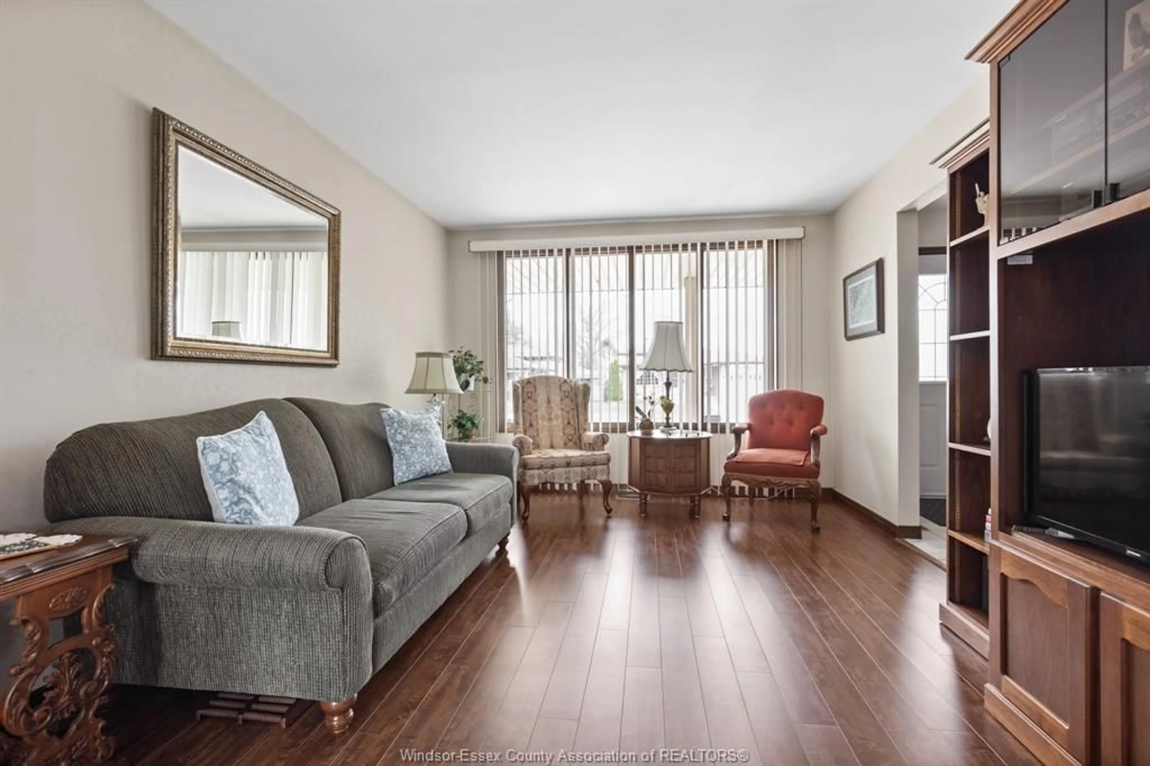 Living room with furniture, wood/laminate floor for 3735 BLISS, Windsor Ontario N8W 3C3