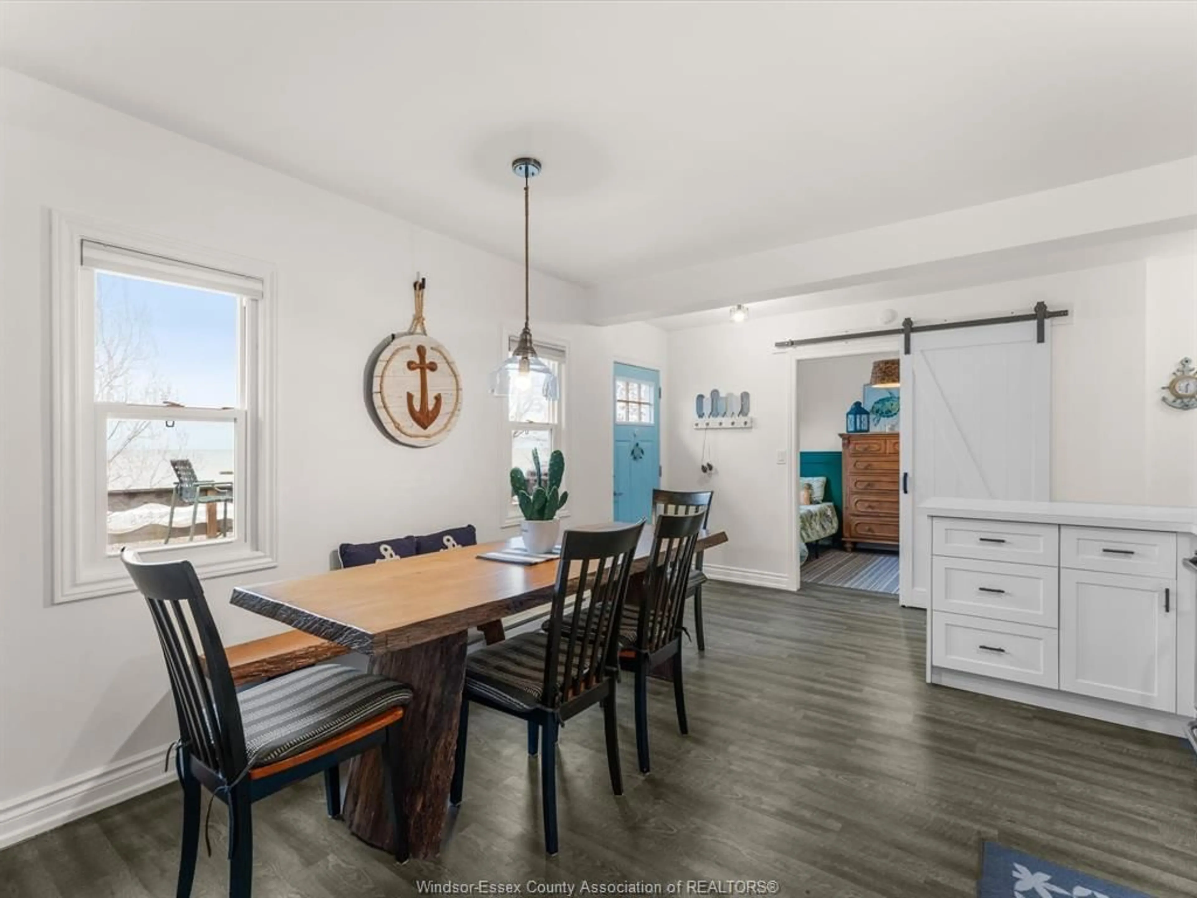 Open concept kitchen, wood/laminate floor for 1962 Ocean Line, Wheatley Ontario N0P 2P0