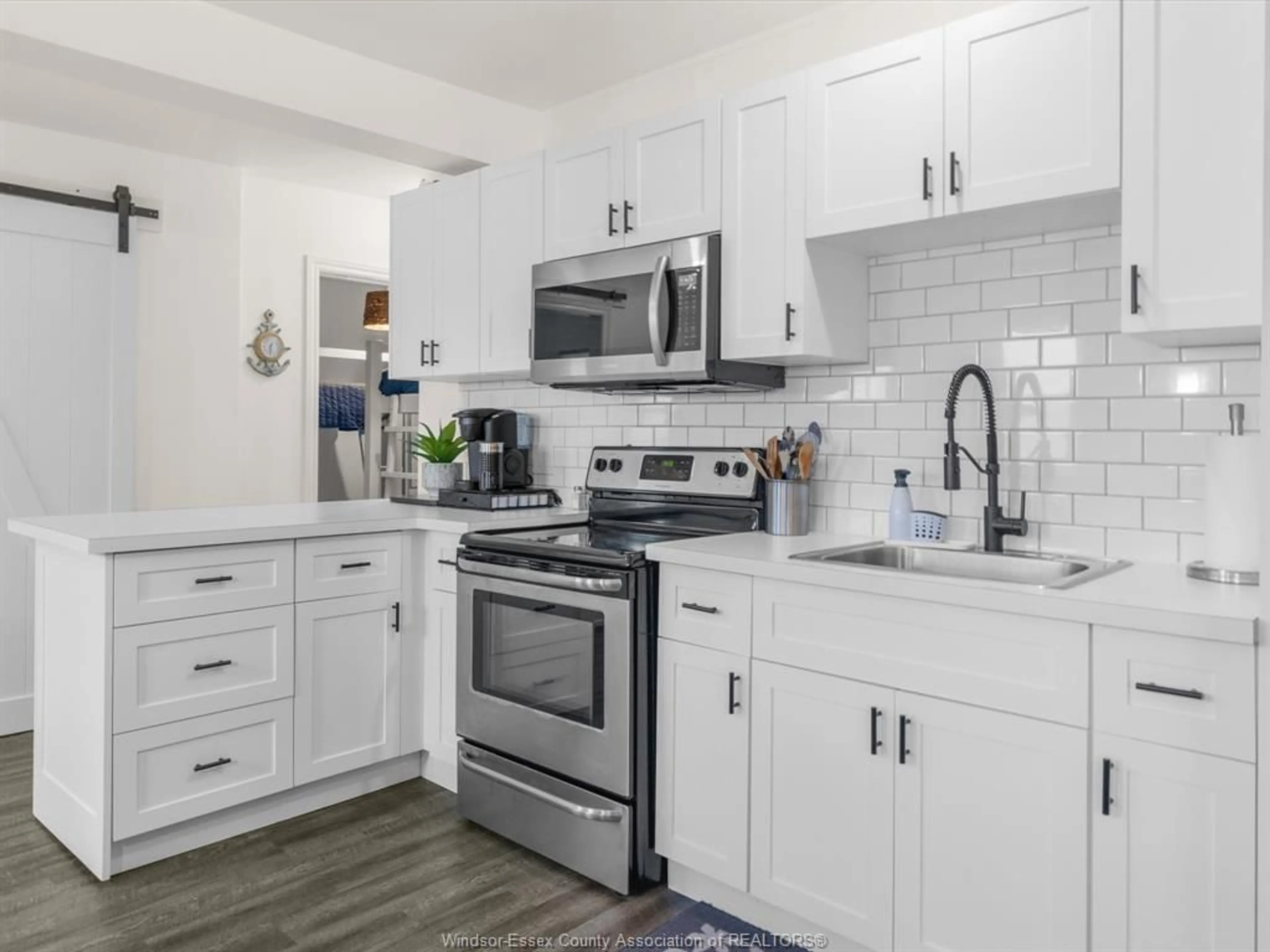 Open concept kitchen, ceramic/tile floor for 1962 Ocean Line, Wheatley Ontario N0P 2P0