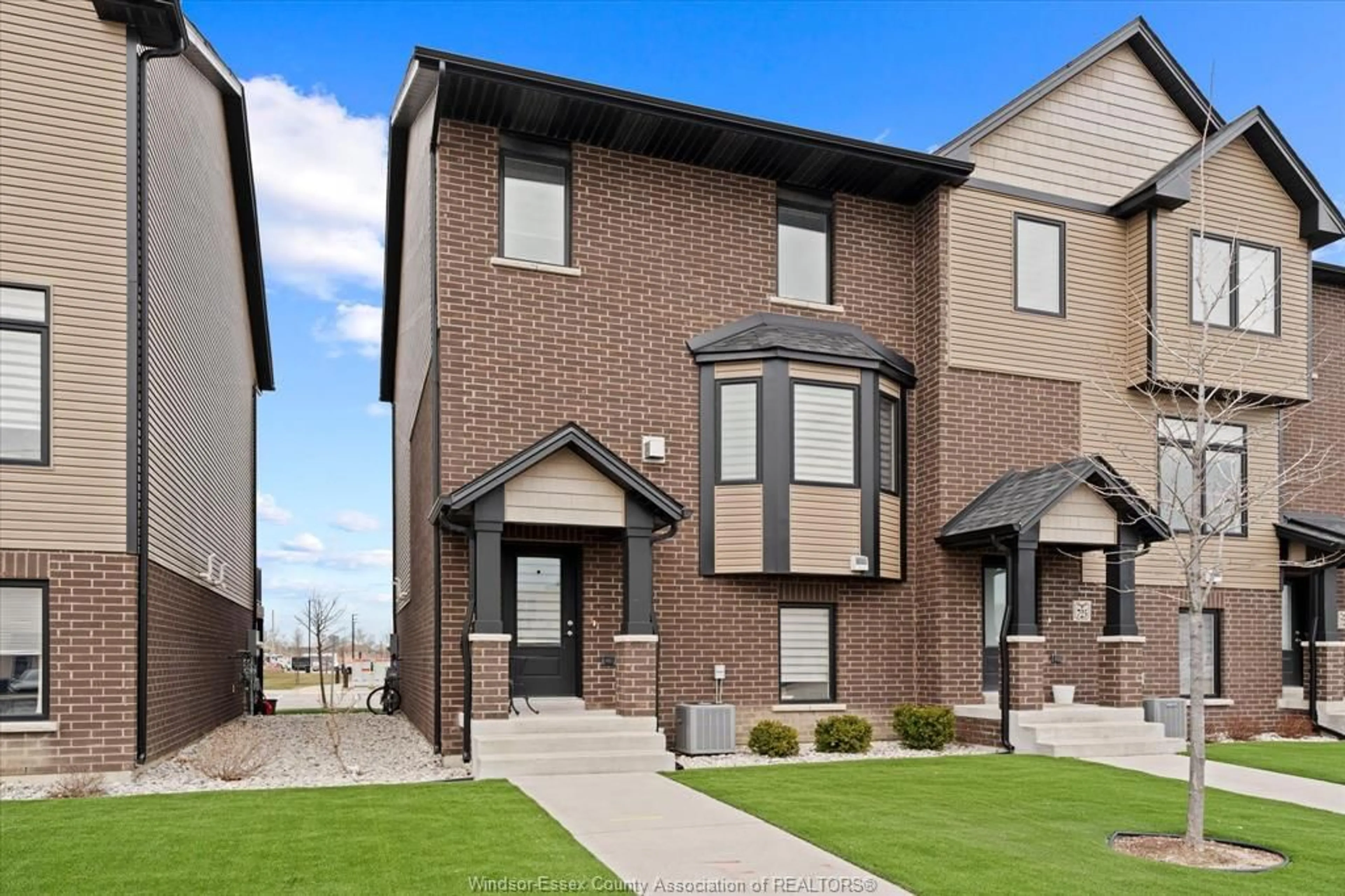 Home with brick exterior material, street for 723 BROWNSTONE Rd, Lakeshore Ontario N9K 0A8