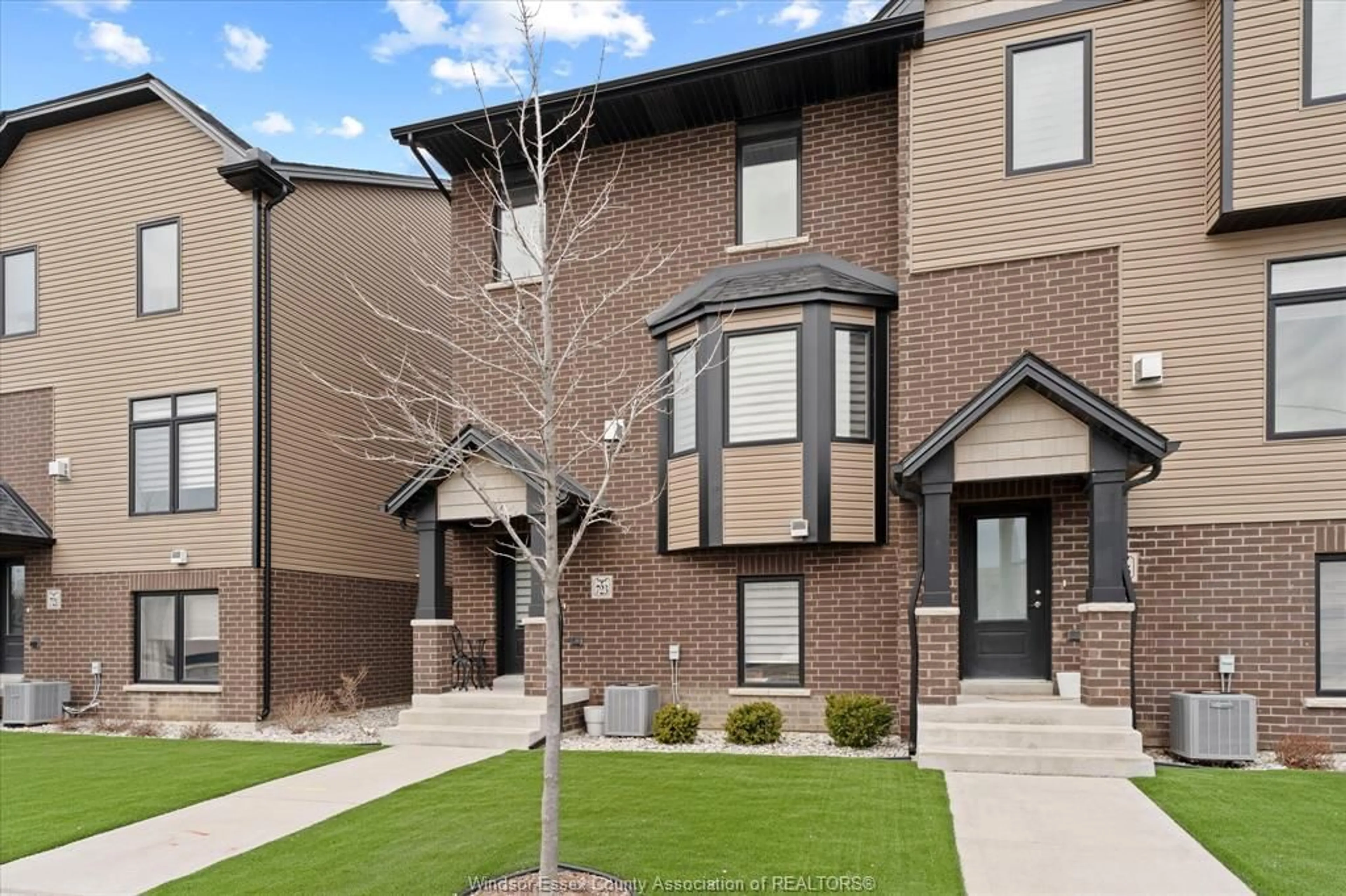 Home with brick exterior material, street for 723 BROWNSTONE Rd, Lakeshore Ontario N9K 0A8