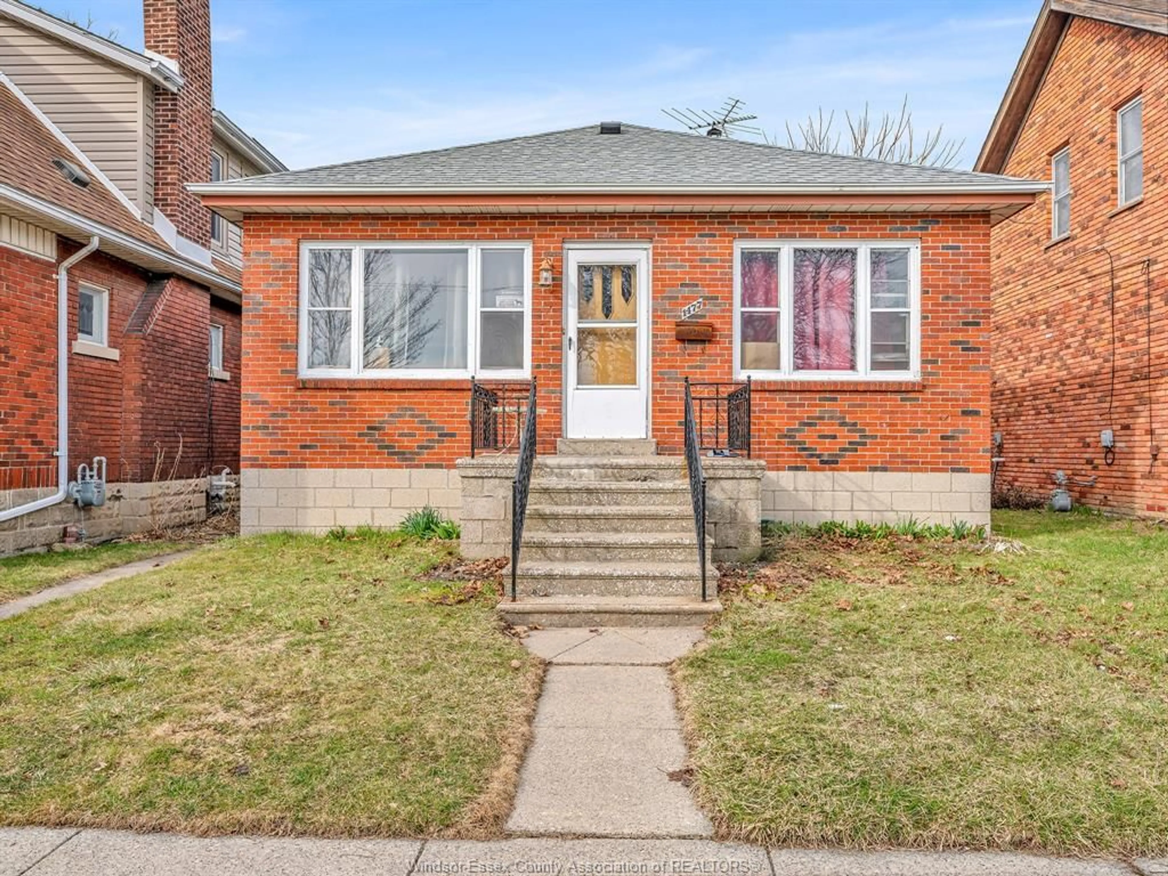 Home with brick exterior material, street for 1477 WINDERMERE Rd, Windsor Ontario N8Y 3G1