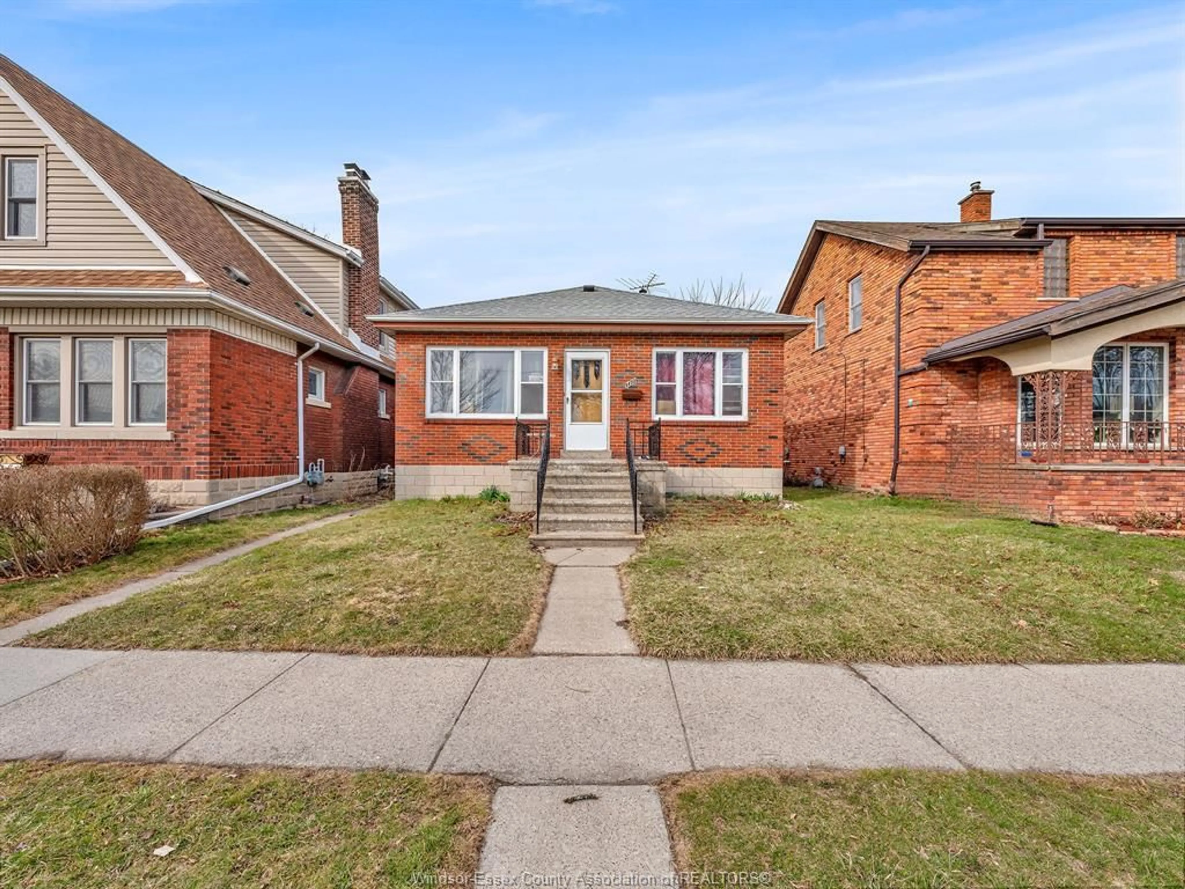 Home with brick exterior material, street for 1477 WINDERMERE Rd, Windsor Ontario N8Y 3G1