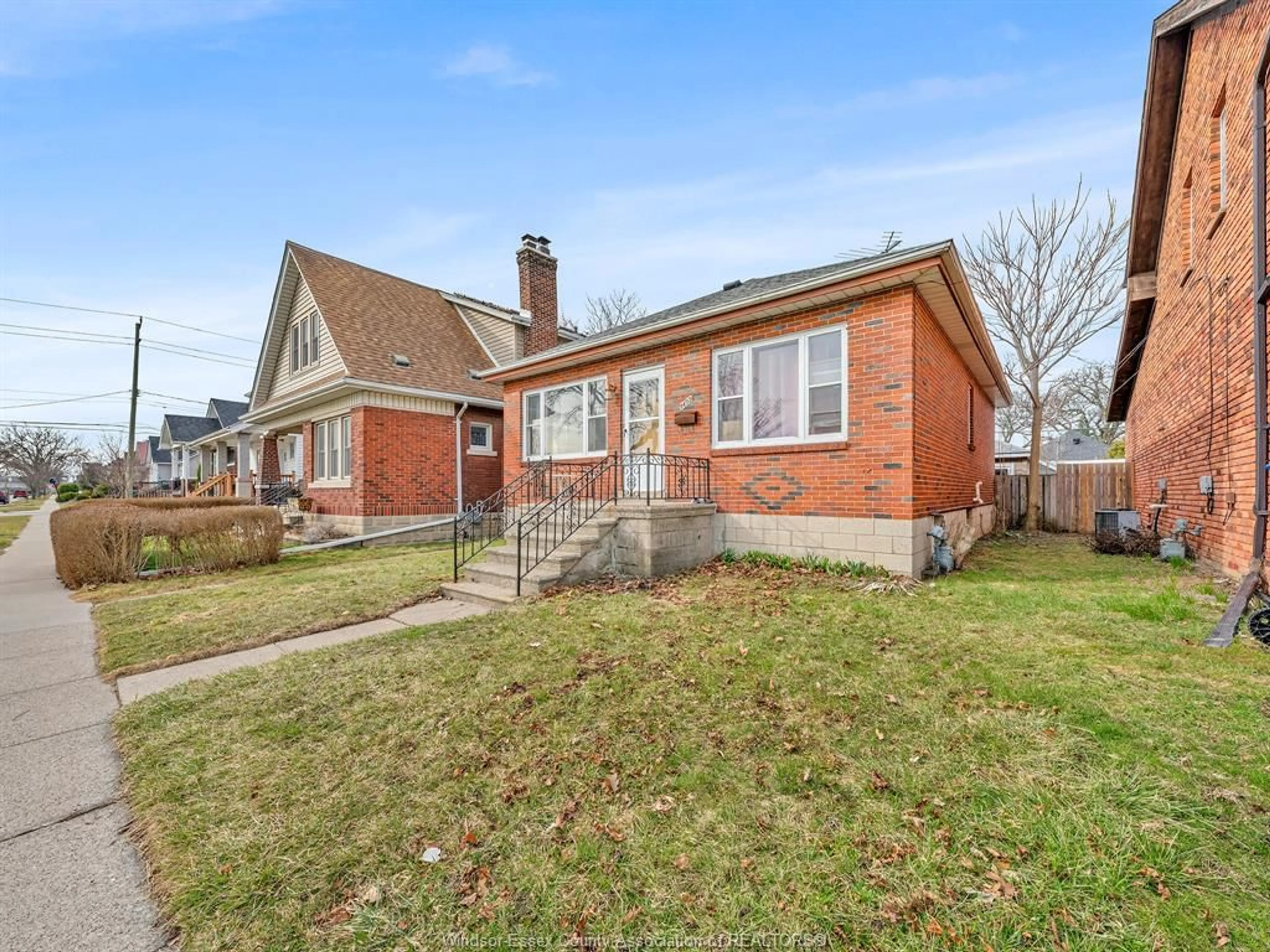 Home with brick exterior material, street for 1477 WINDERMERE Rd, Windsor Ontario N8Y 3G1