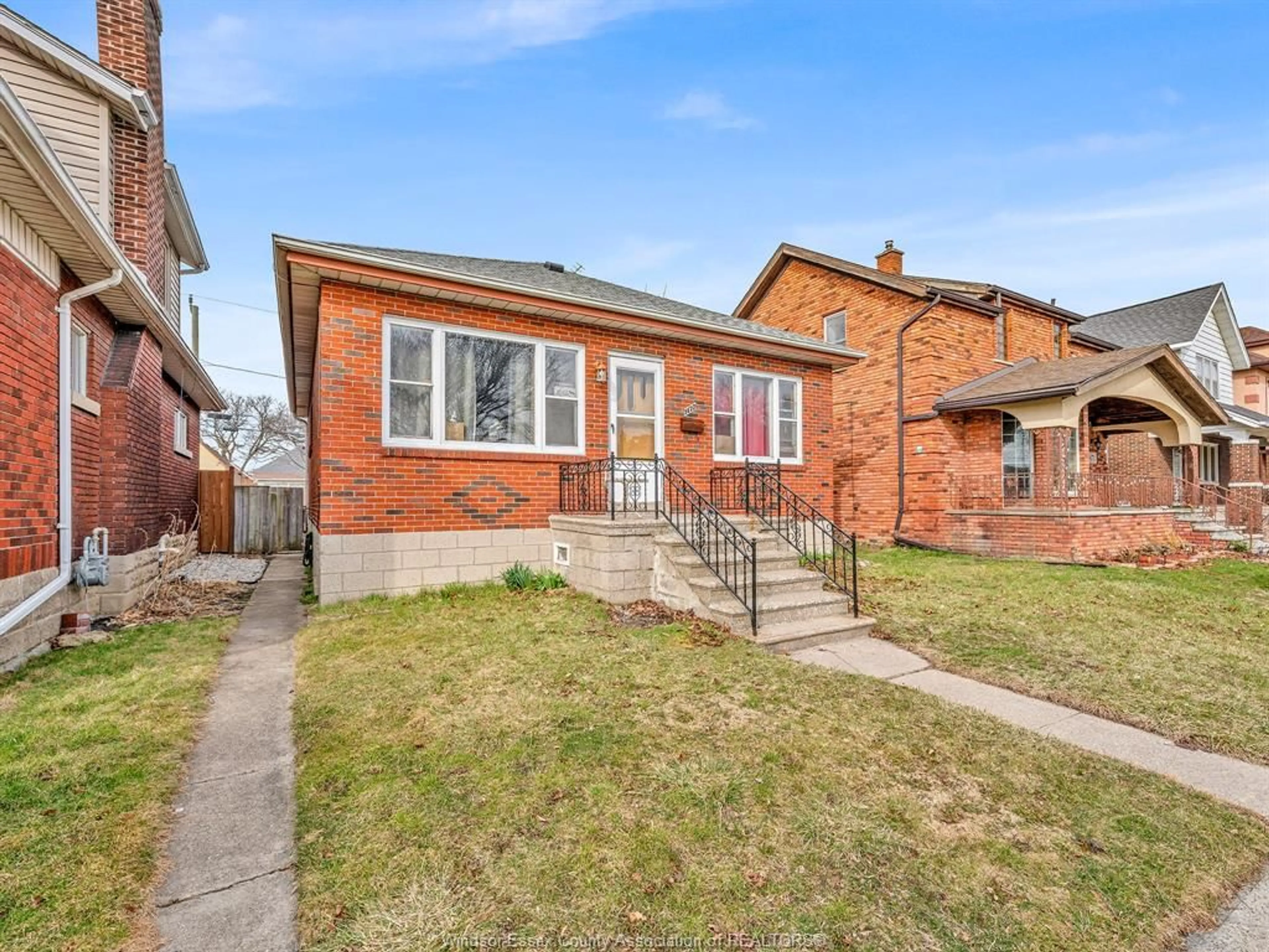 Home with brick exterior material, street for 1477 WINDERMERE Rd, Windsor Ontario N8Y 3G1