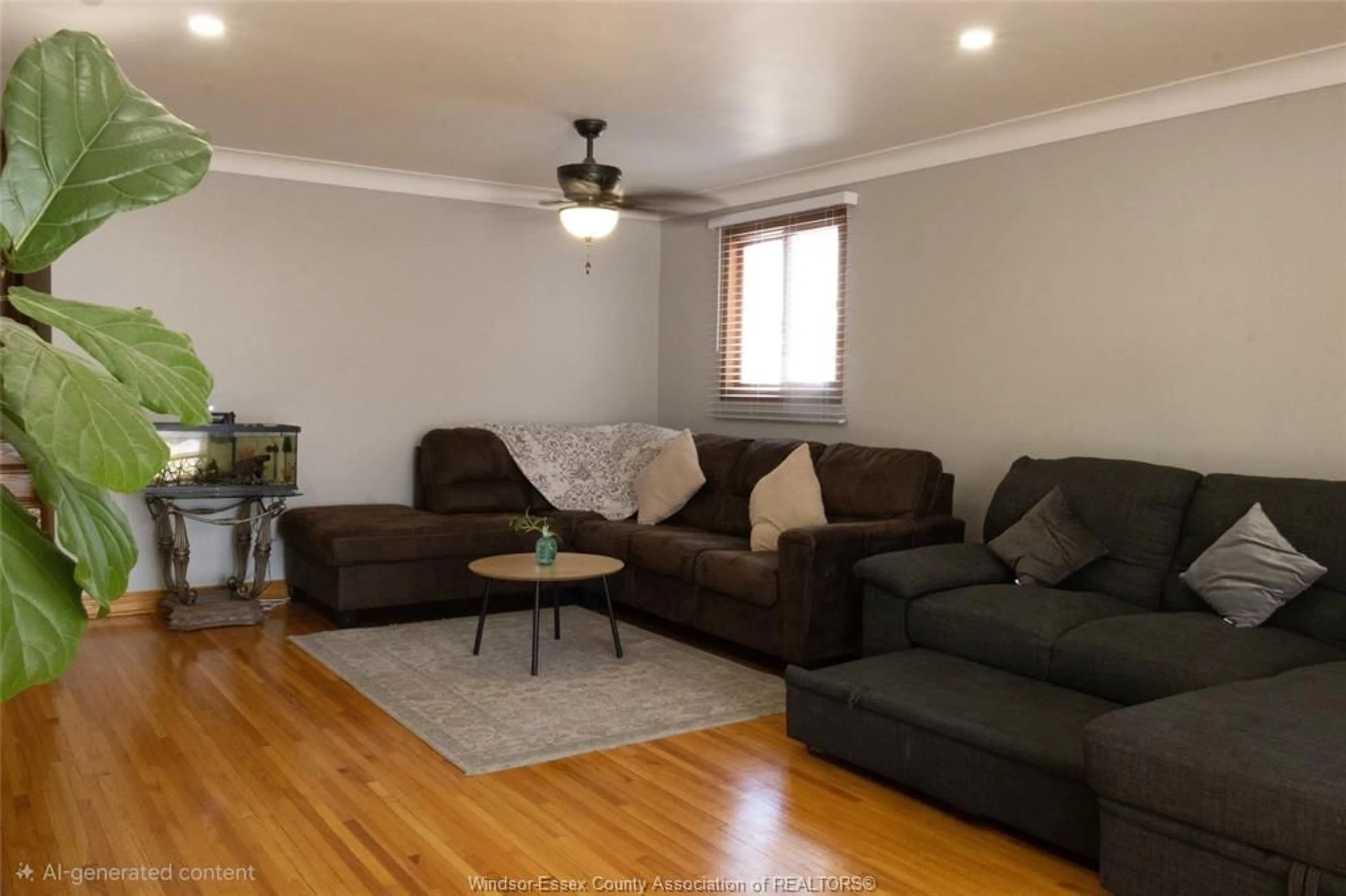 Living room with furniture, wood/laminate floor for 1616 BURWELL Crt, Windsor Ontario N9C 3Z8