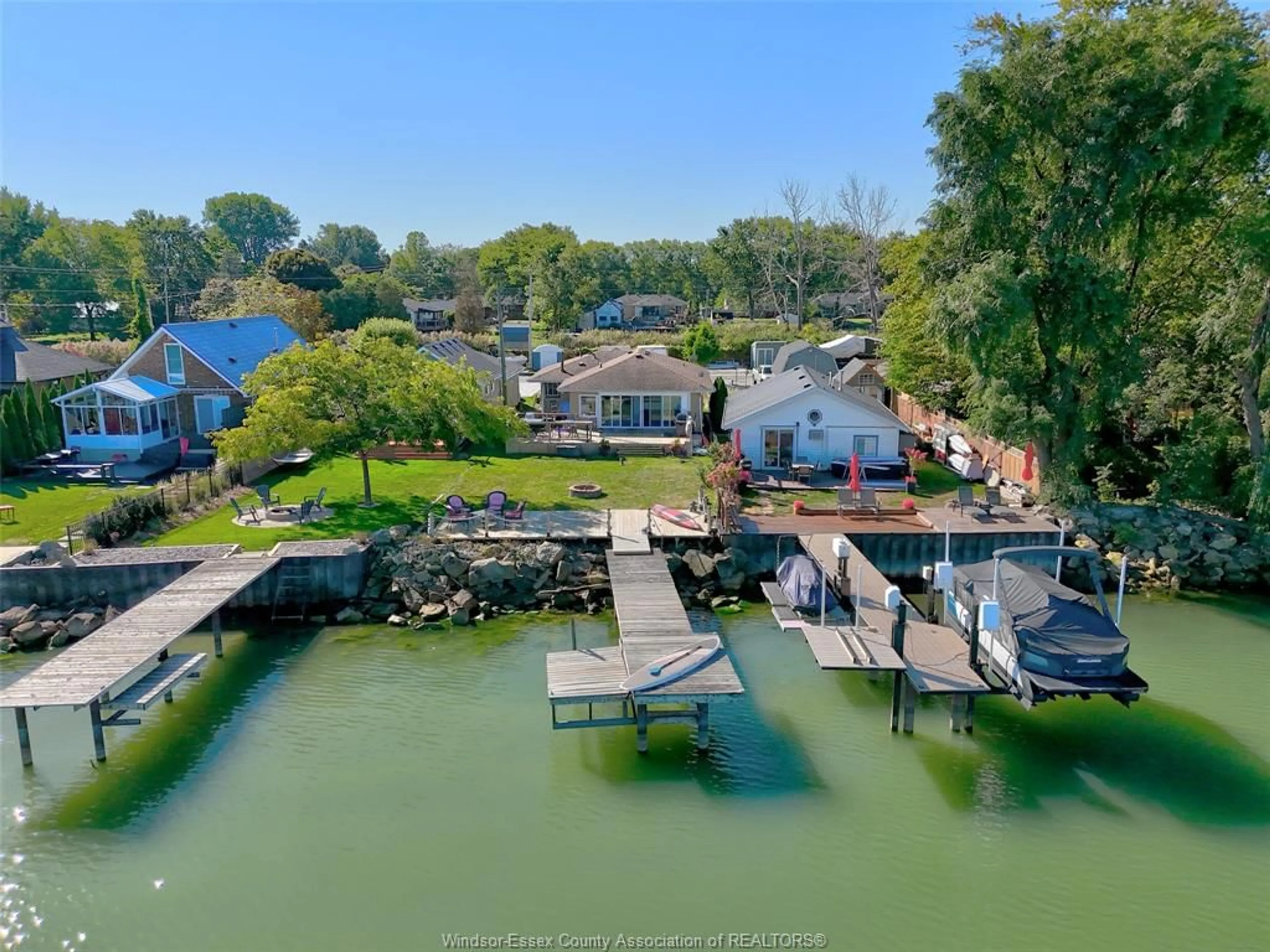 A pic from outside/outdoor area/front of a property/back of a property/a pic from drone, water/lake/river/ocean view for 591 ROSS BEACH, Belle River Ontario N8L 1J6