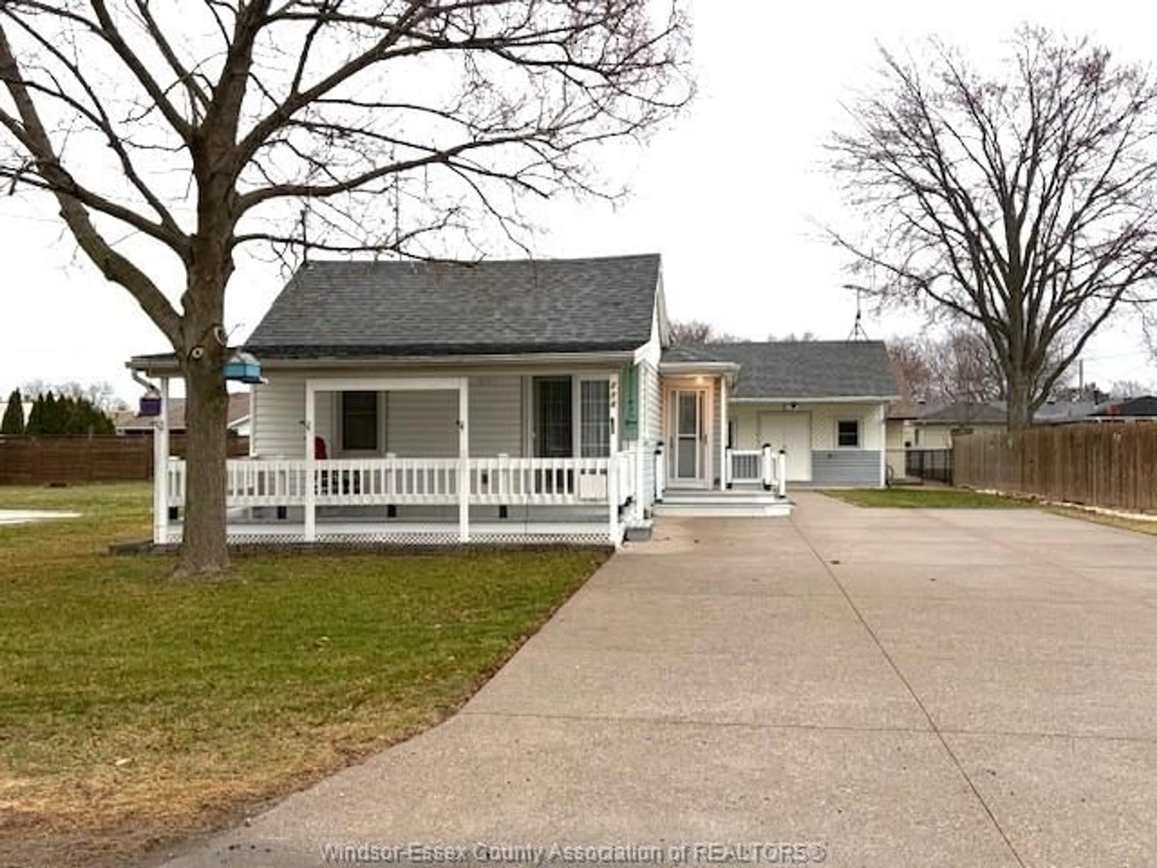 Home with vinyl exterior material, street for 214 Caruhel Dr., Lakeshore Ontario N0R 1C0