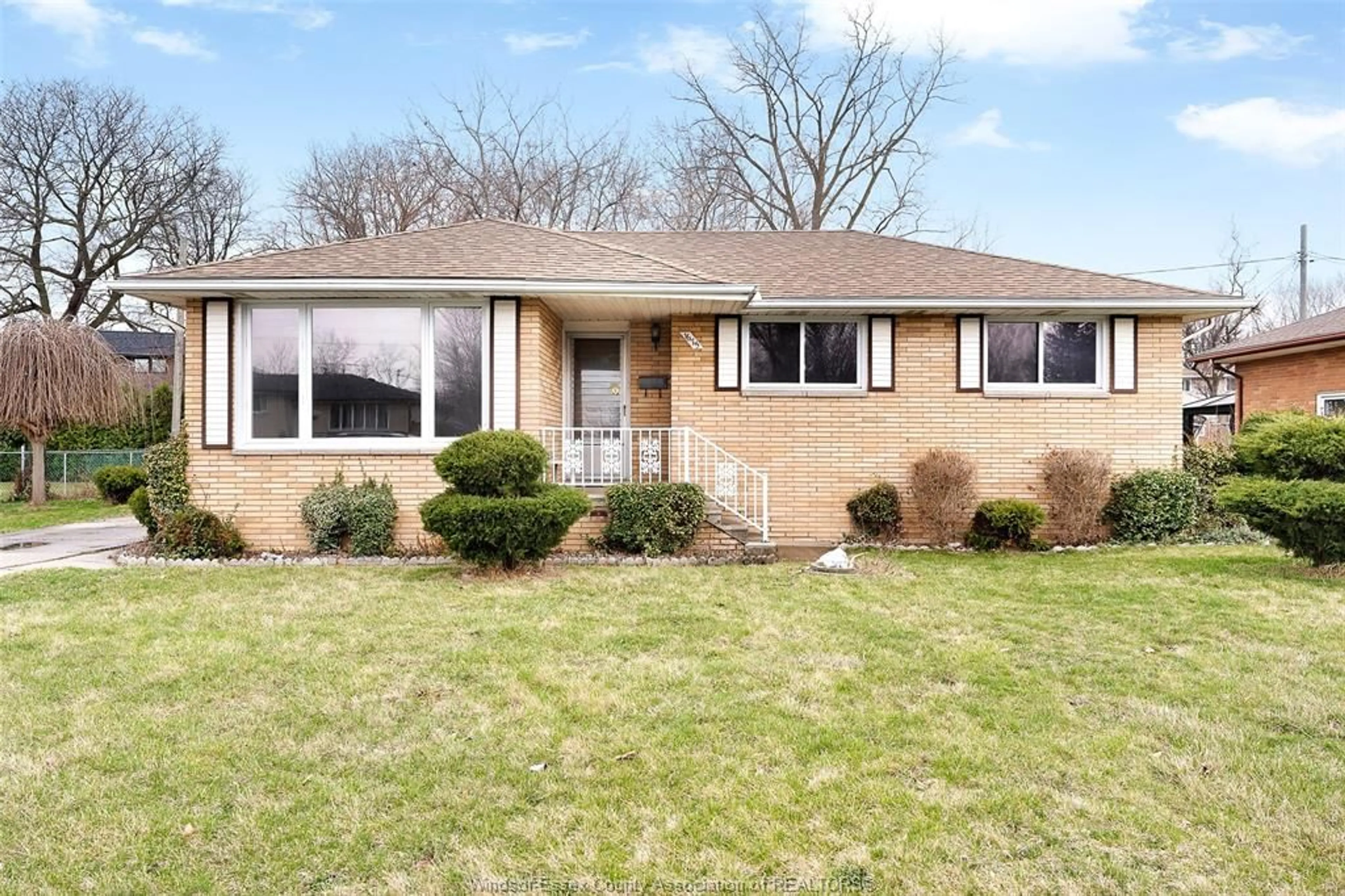 Home with brick exterior material, street for 1675 Campbell, Windsor Ontario N9B 2K5