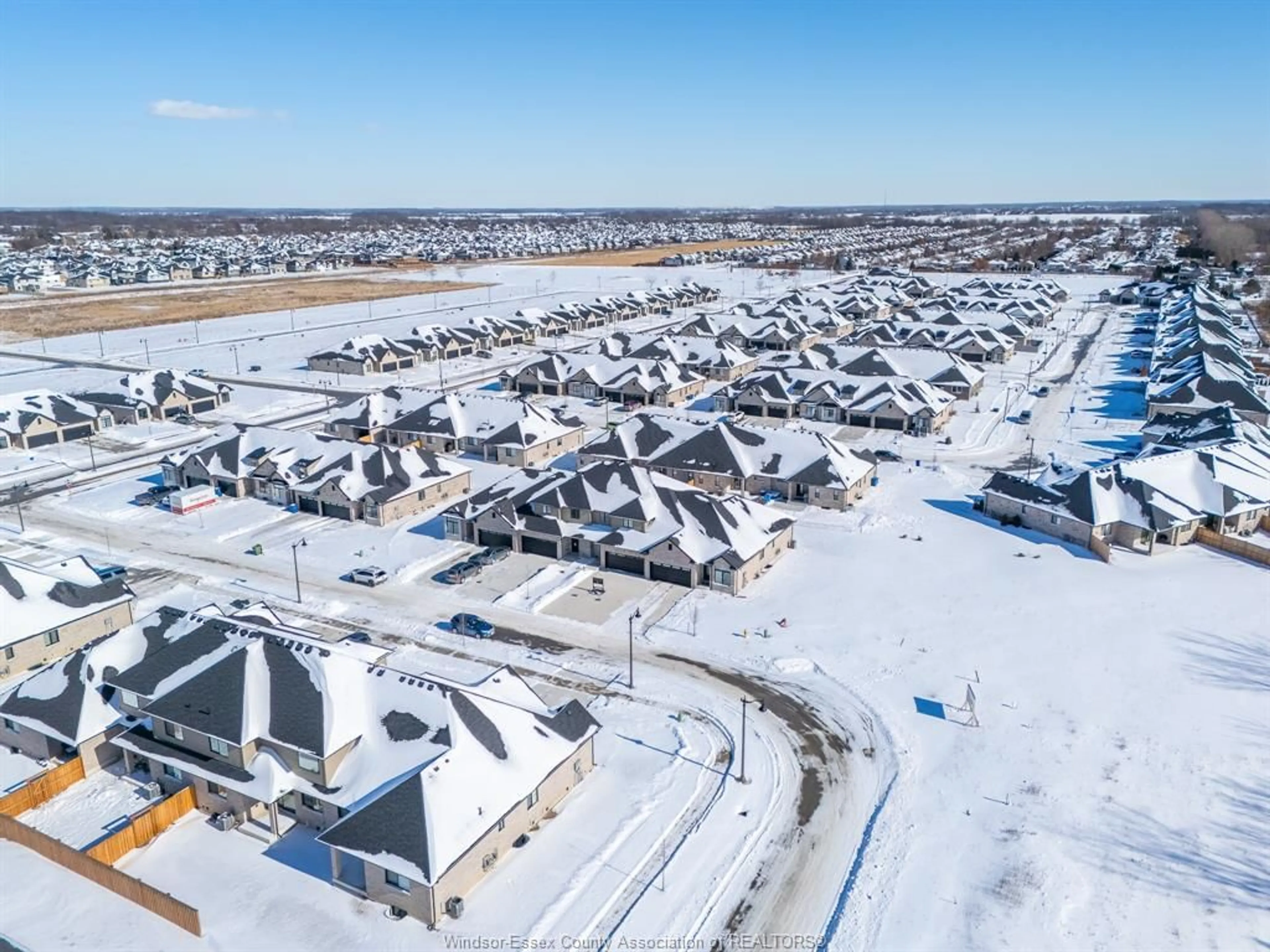 A pic from outside/outdoor area/front of a property/back of a property/a pic from drone, street for 58 Callams Bay Cres, Amherstburg Ontario N9V 0H1