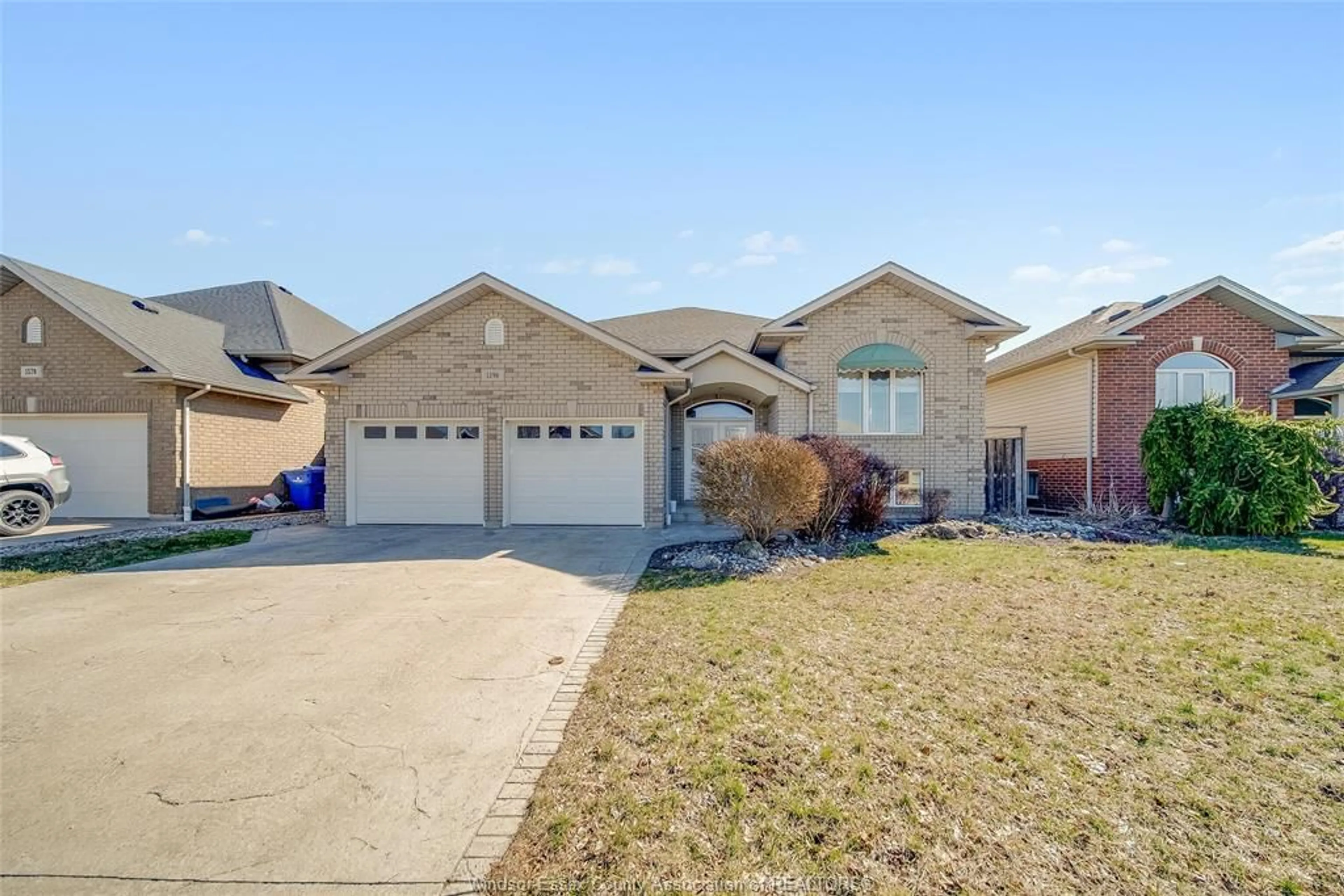 Home with brick exterior material, street for 1596 MORNINGSTAR Ave, Windsor Ontario N8P 1P9