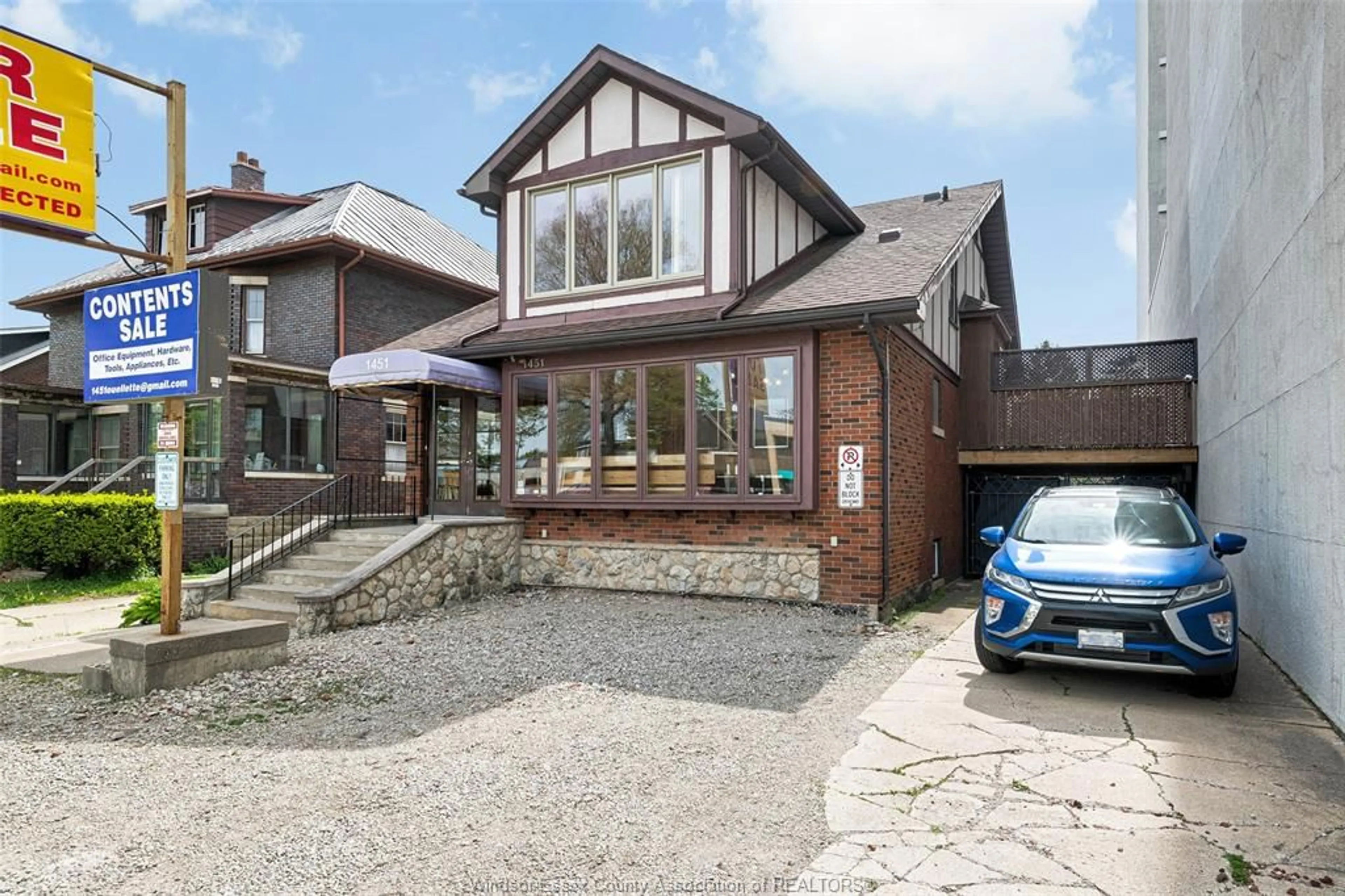 Home with brick exterior material, street for 1451 OUELLETTE Ave, Windsor Ontario N8X 1K1