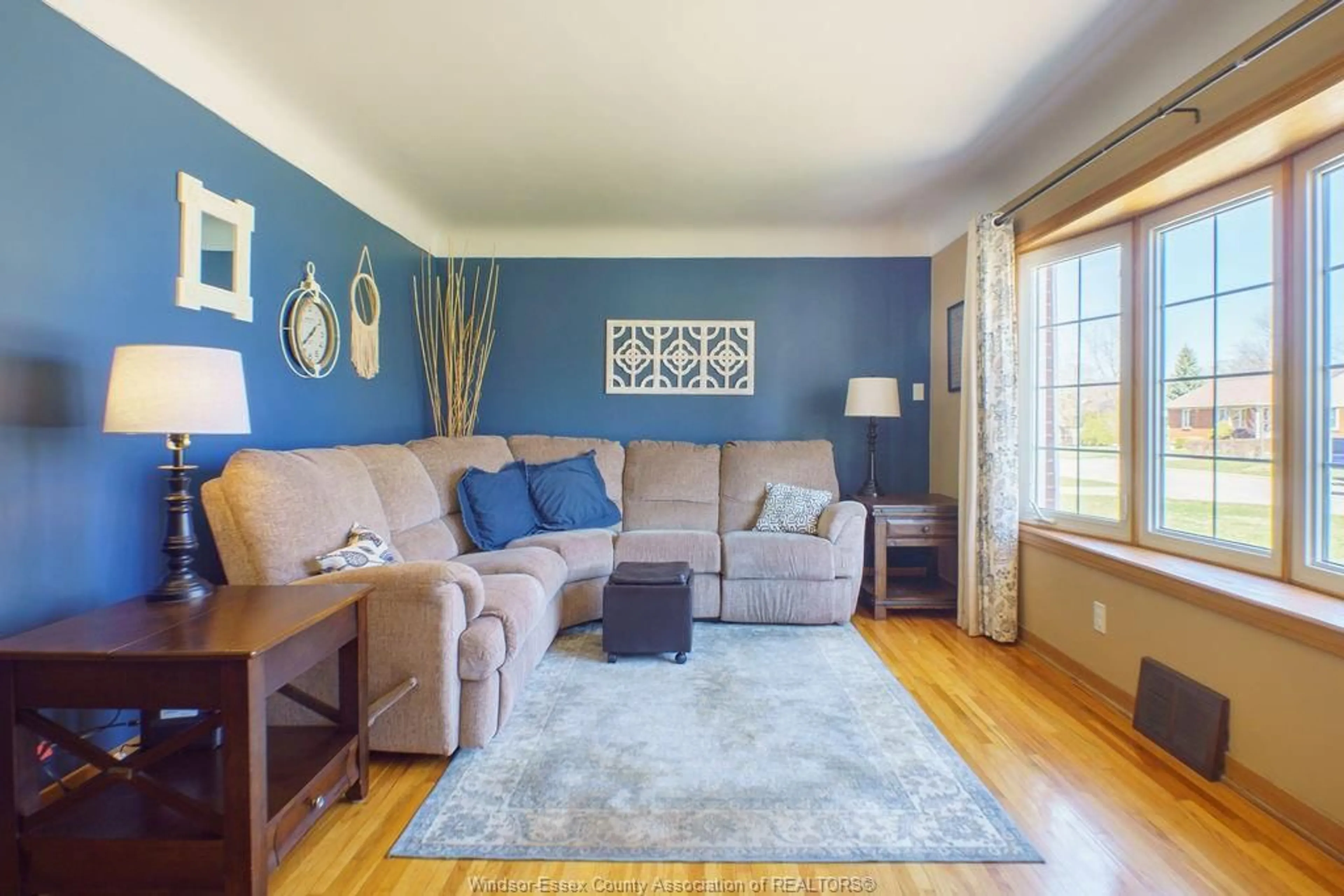 Living room with furniture, unknown for 939 Isabelle Pl, Windsor Ontario N8S 3B1