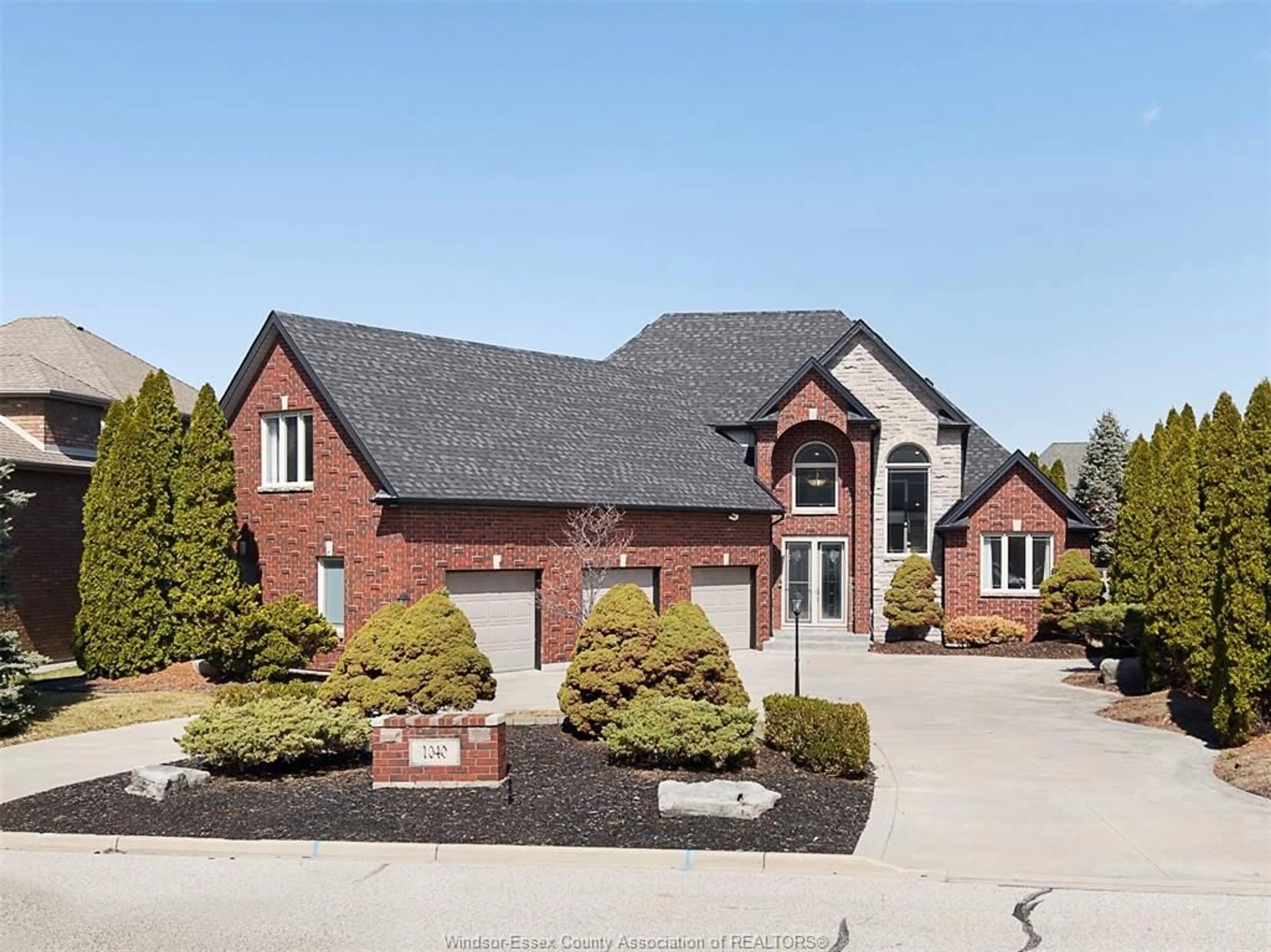 Home with brick exterior material, street for 1040 Chelsea Park Way, Lakeshore Ontario N8L 0W1