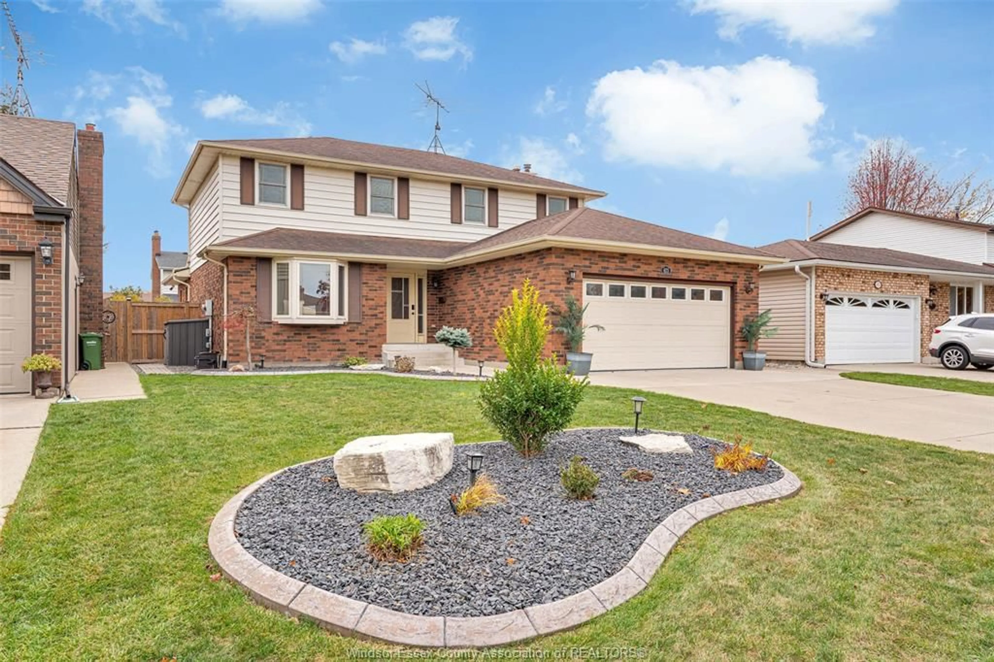 Home with brick exterior material, street for 673 Gauthier, Tecumseh Ontario N8N 3P7