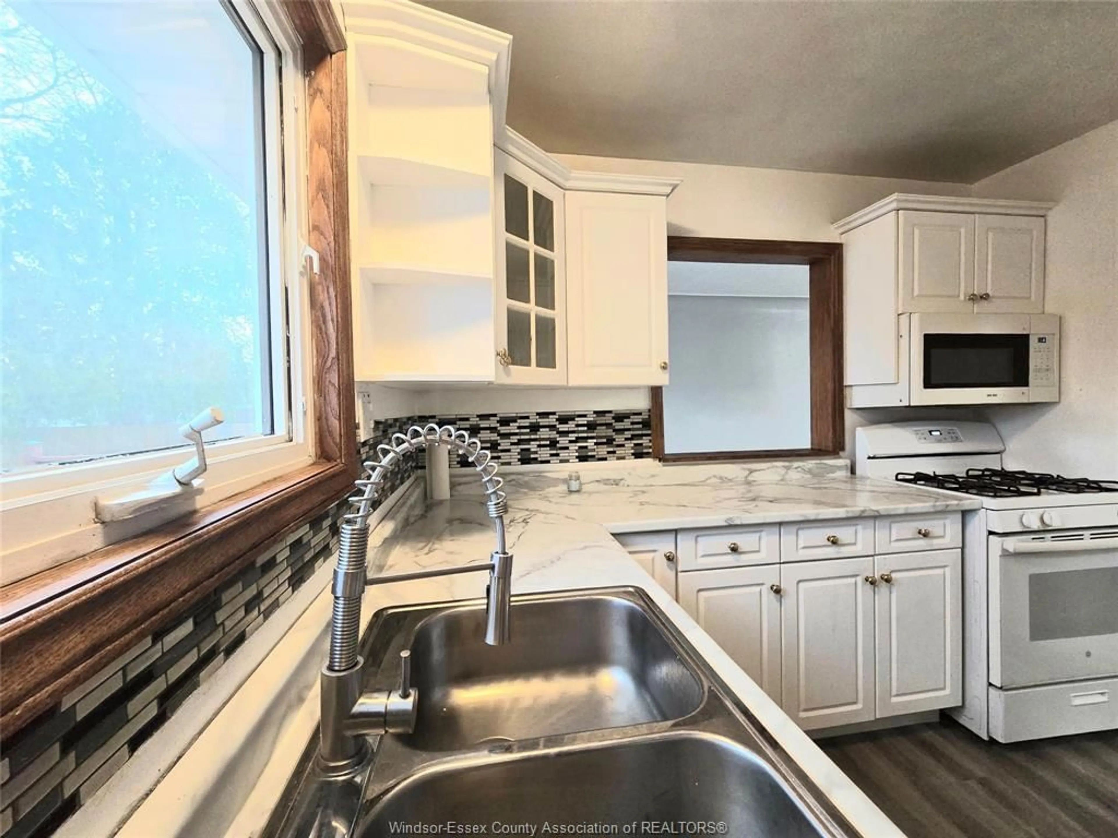 Open concept kitchen, unknown for 3672 MORRIS Dr, Windsor Ontario N9E 2K7