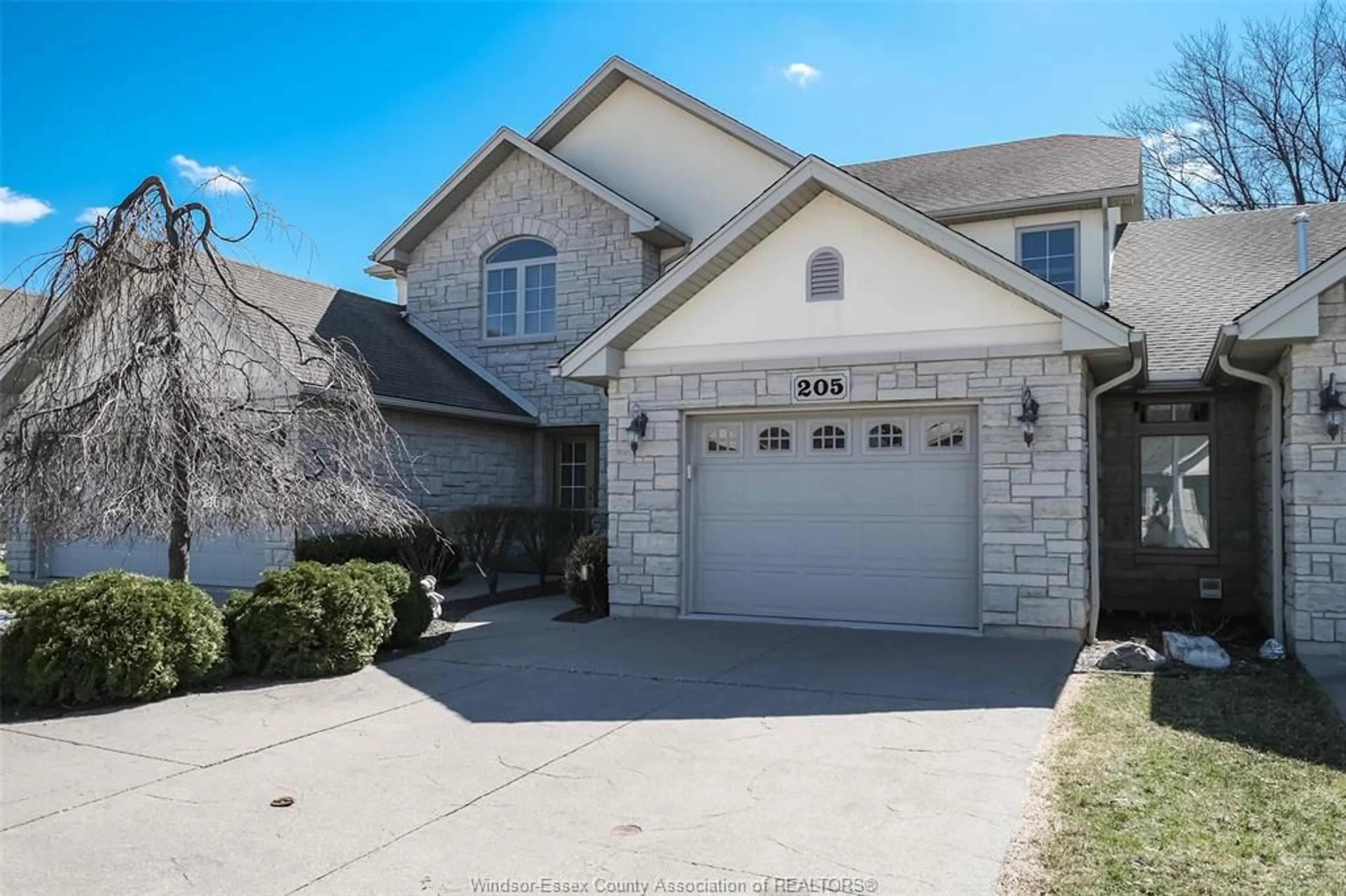 Home with brick exterior material, street for 205 WHISPER CREEK, Lakeshore Ontario N9K 1G3
