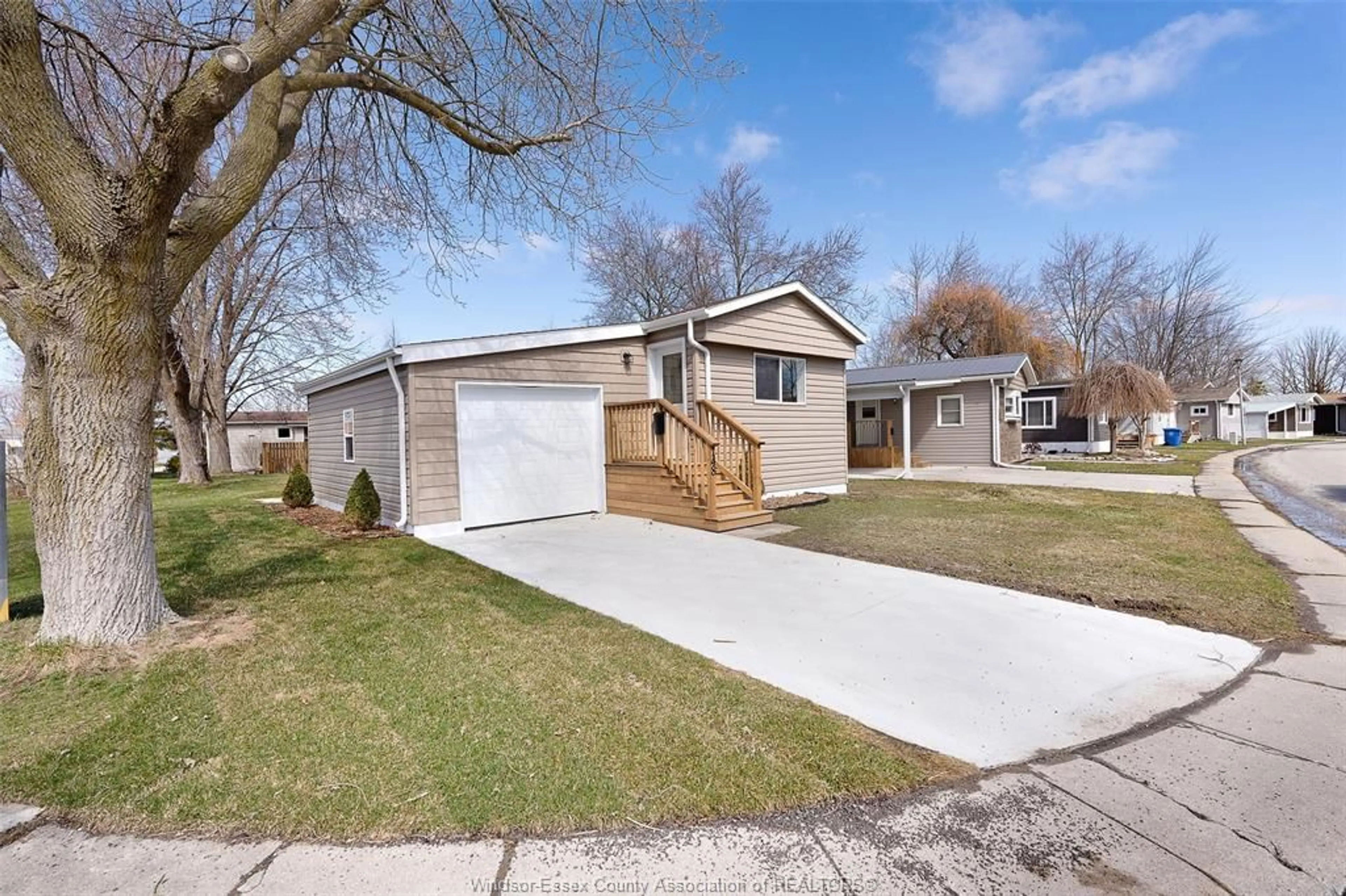 Home with vinyl exterior material, street for 148 DANA St, Essex Ontario N8M 1Z9