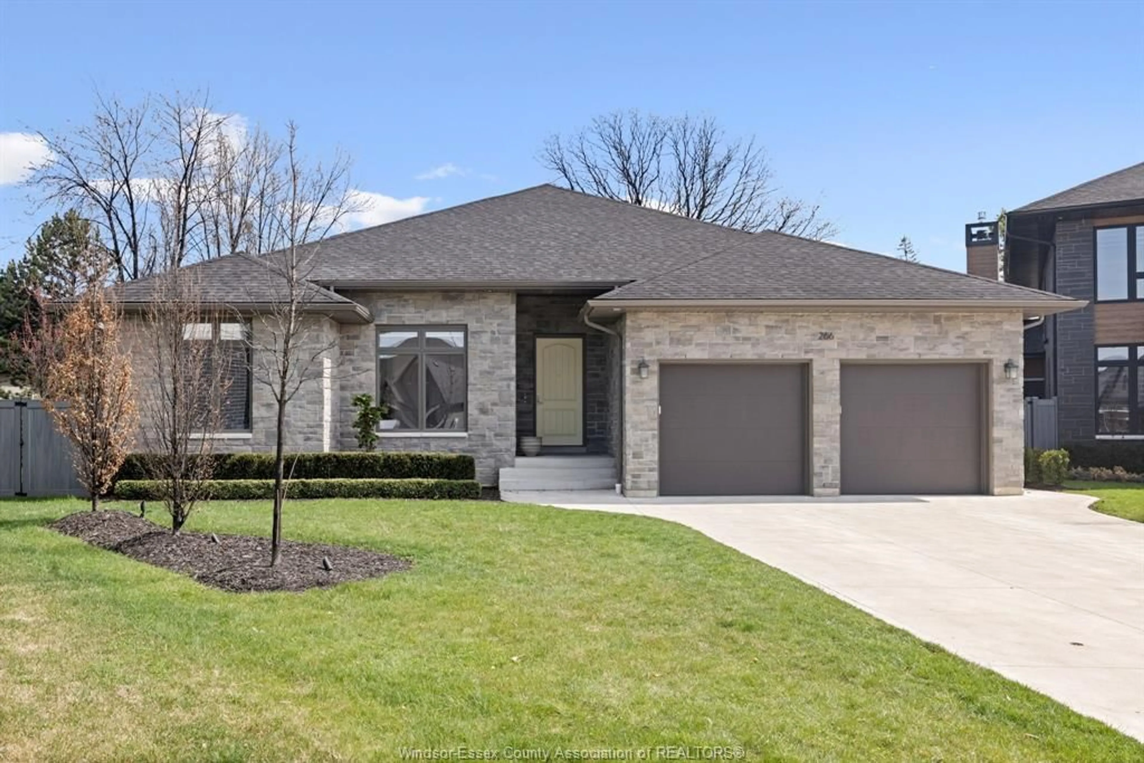 Home with brick exterior material, street for 266 XAVIER Cir, Lakeshore Ontario N8N 0J3