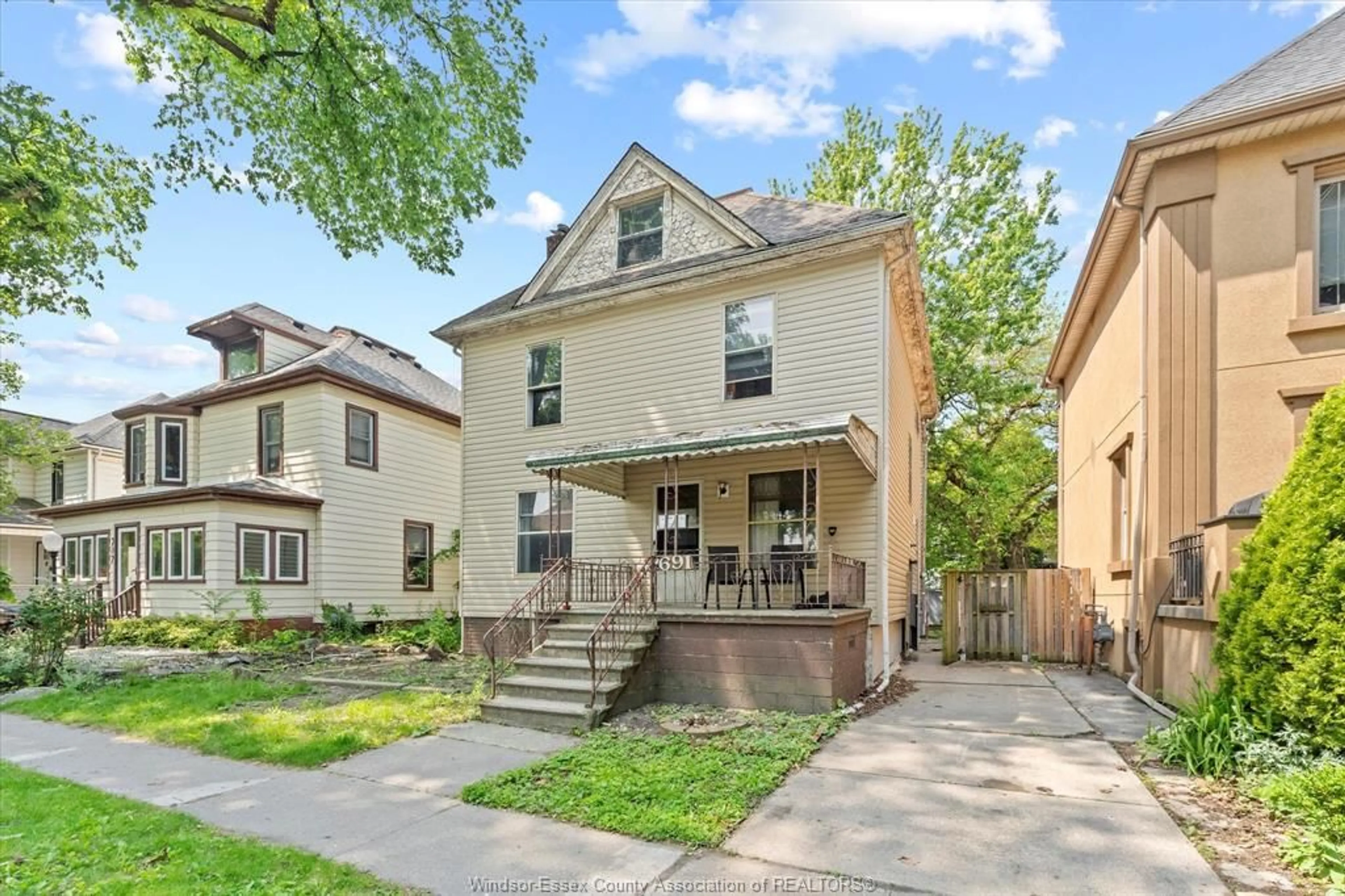 Home with brick exterior material, street for 691 WINDERMERE Rd, Windsor Ontario N8Y 3E2