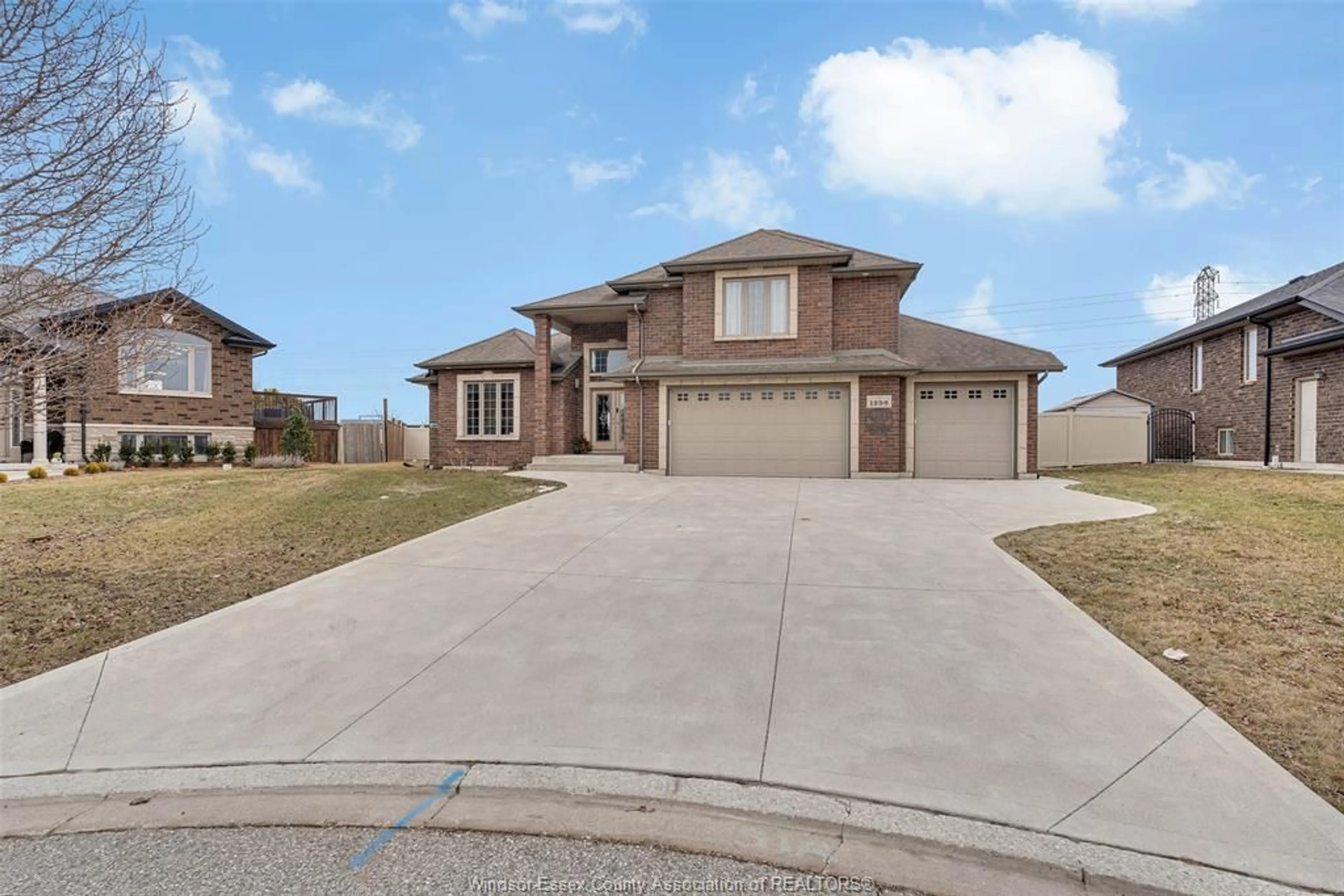 Home with brick exterior material, street for 1298 DEER RUN Trail, Lakeshore Ontario N8L 0S8