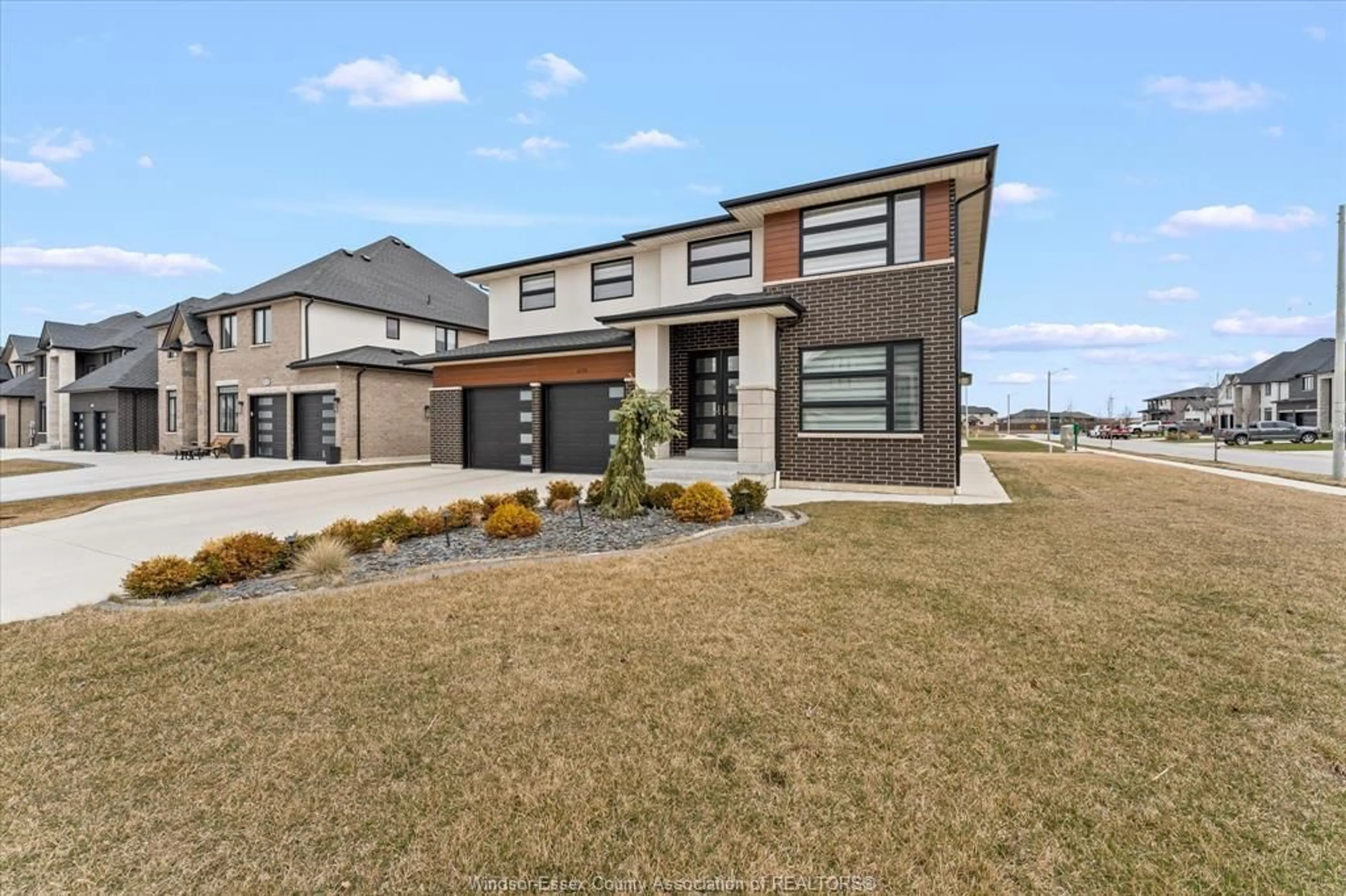 Home with brick exterior material, street for 635 MARCHE St, Lakeshore Ontario N8L 0K2