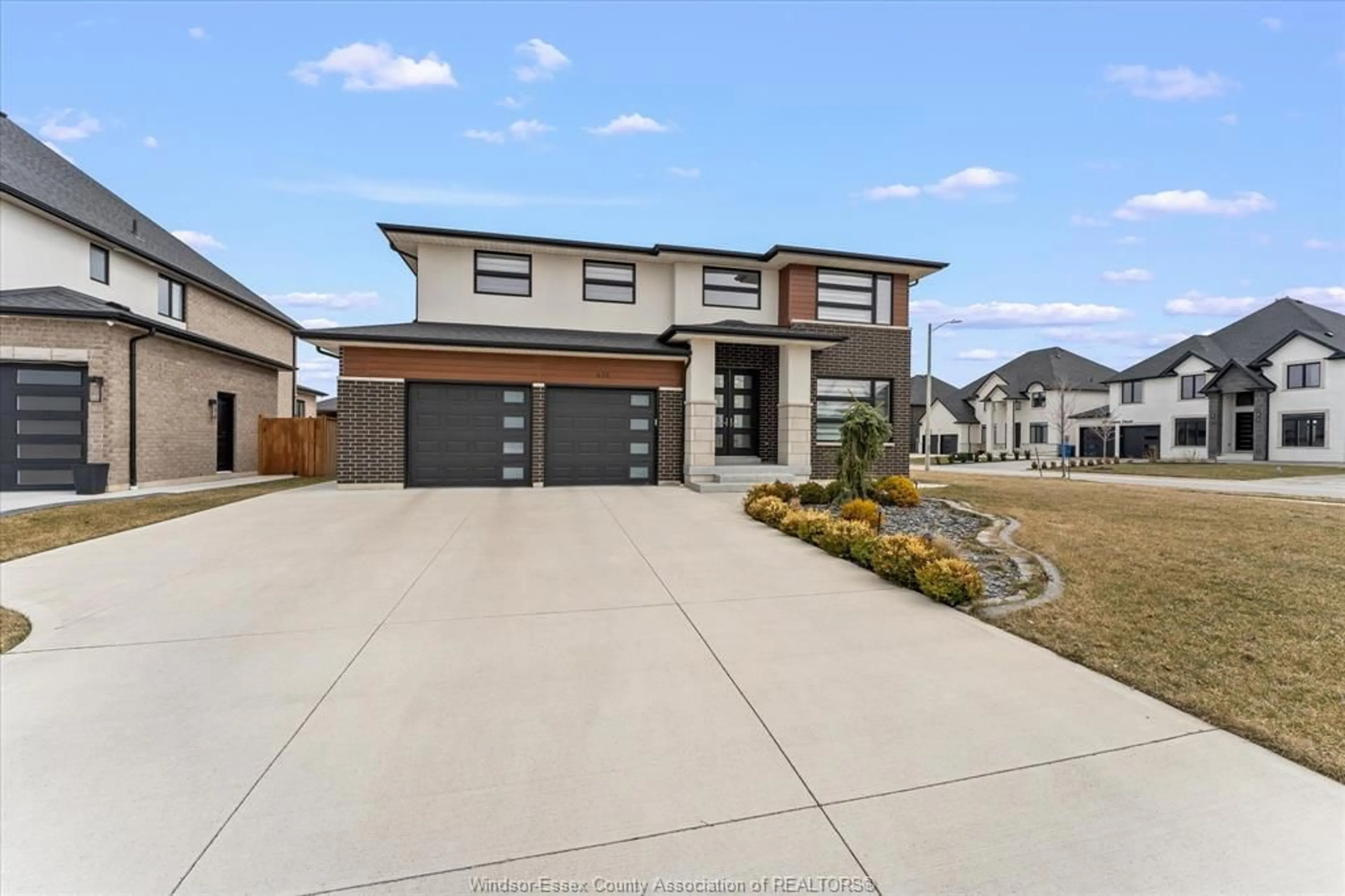 A pic from outside/outdoor area/front of a property/back of a property/a pic from drone, street for 635 MARCHE St, Lakeshore Ontario N8L 0K2