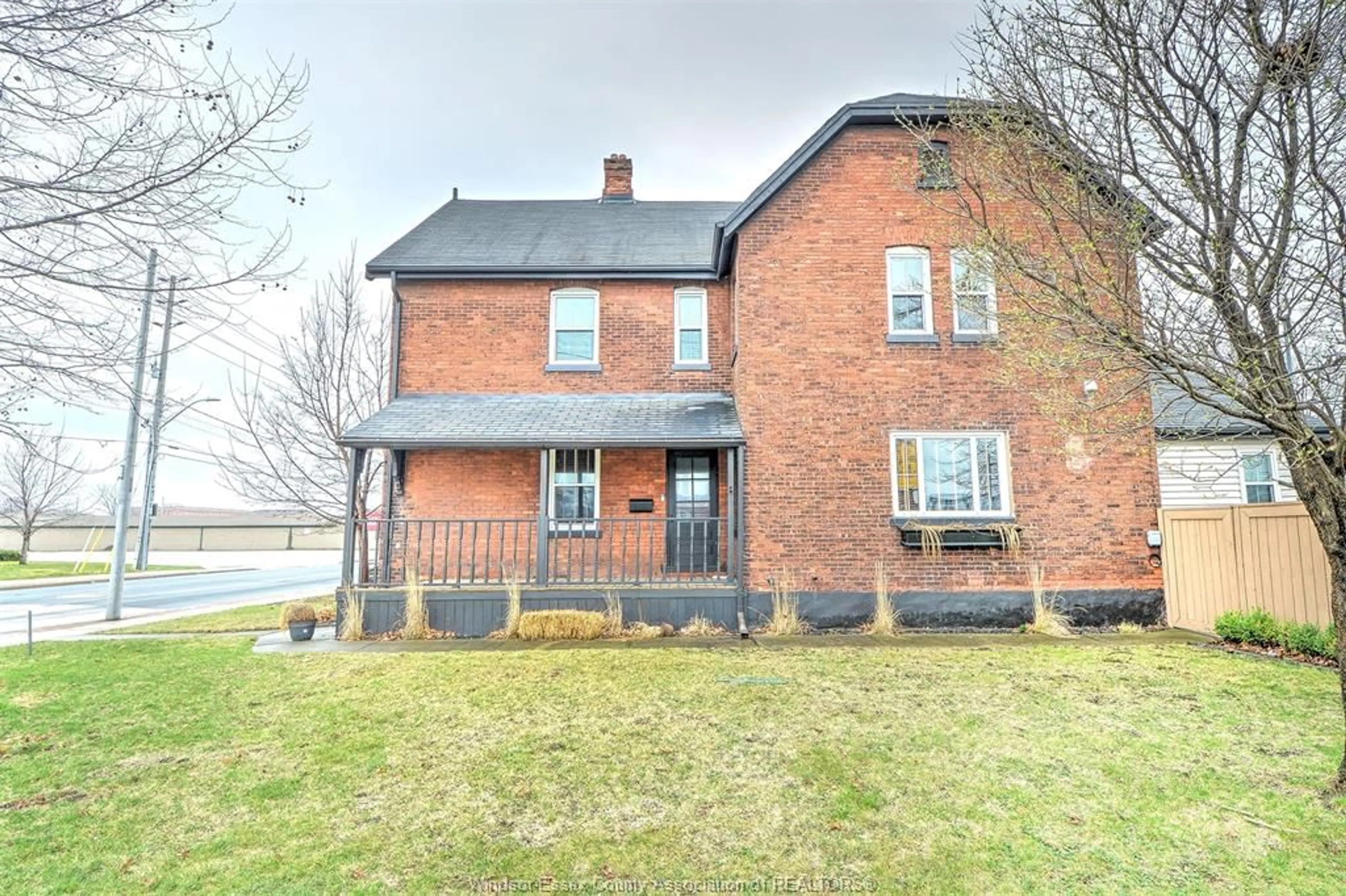 Home with brick exterior material, street for 715 WALKER Rd, Windsor Ontario N8Y 2N2