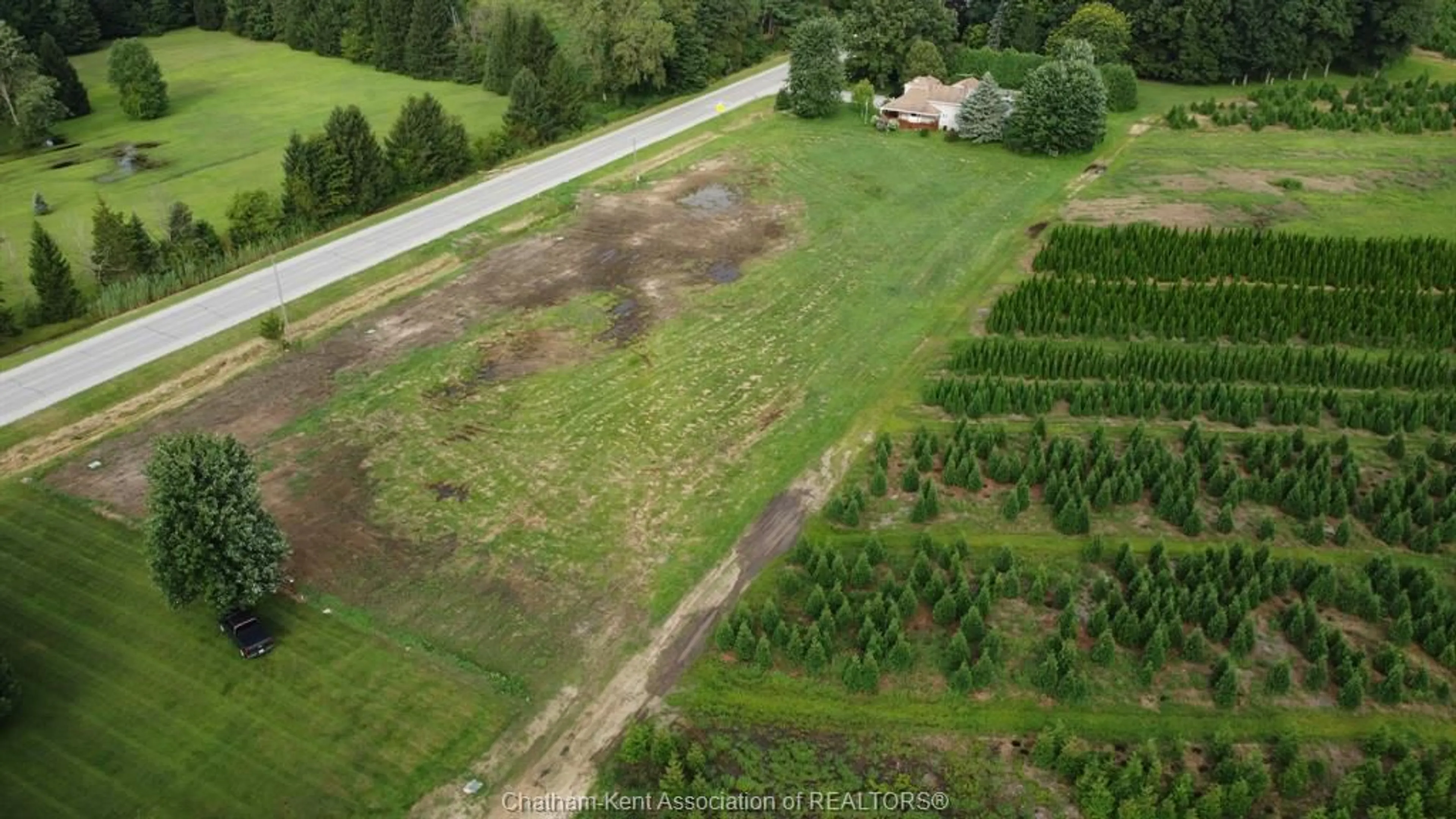 A pic from outside/outdoor area/front of a property/back of a property/a pic from drone, forest/trees view for 15013 MAIN Line, Bothwell Ontario N0P 1C0