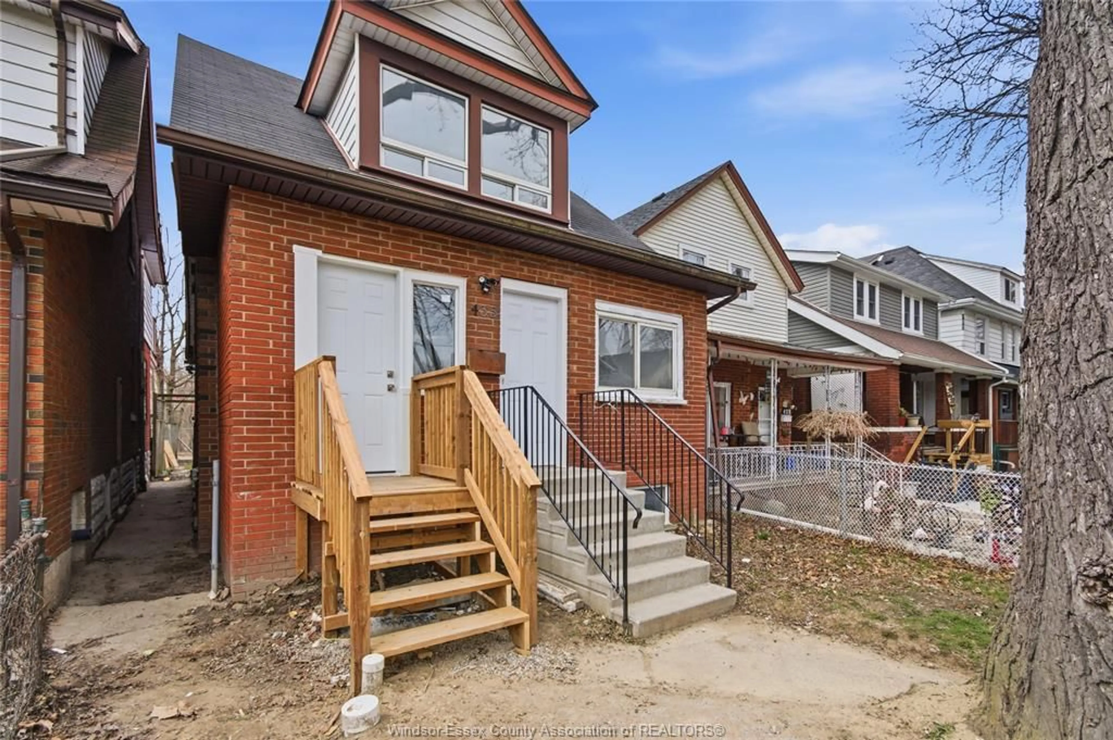 Home with brick exterior material, street for 435 CARON Ave, Windsor Ontario N8A 5B3