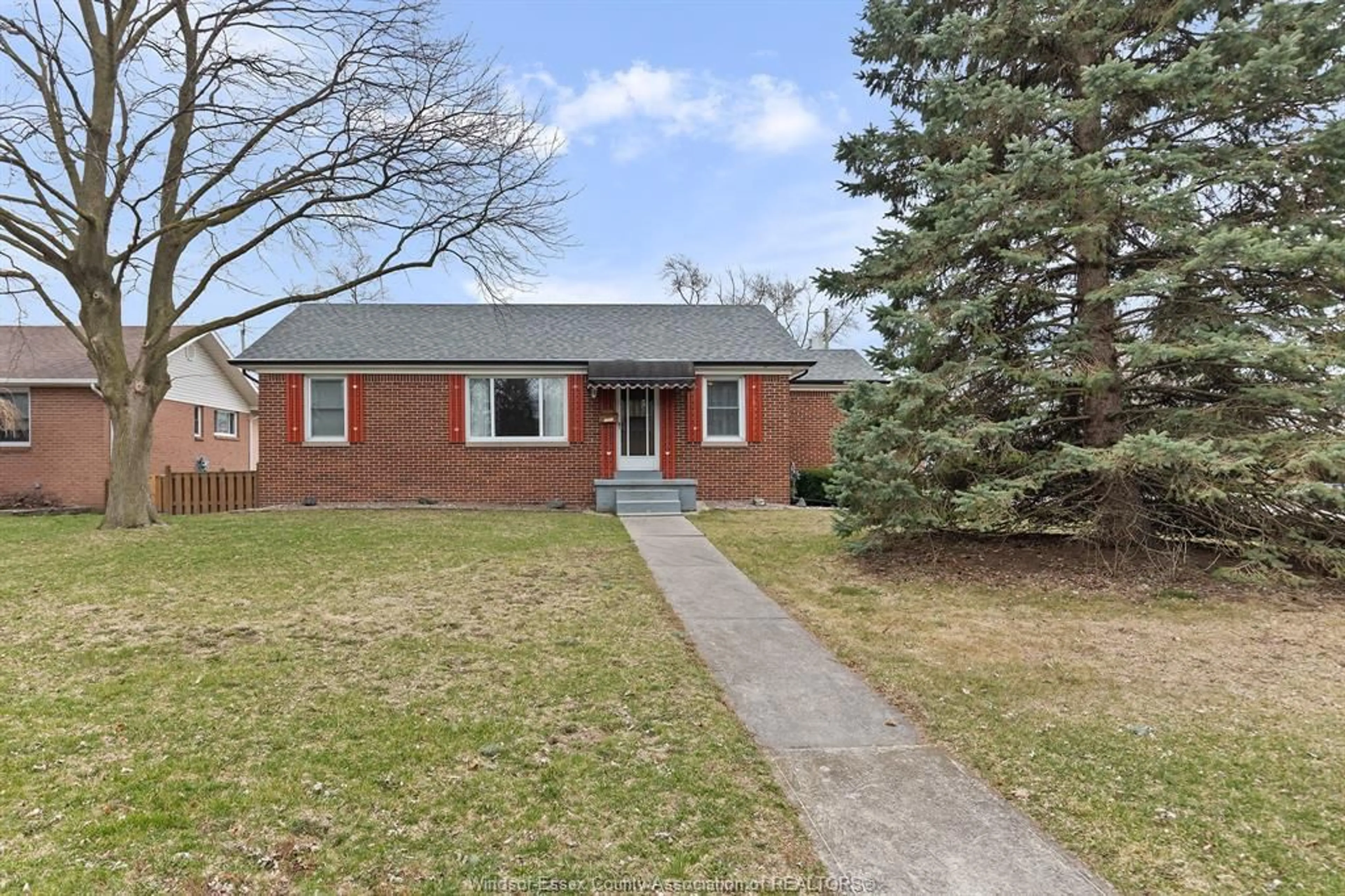 Home with brick exterior material, street for 1231 Roselawn Dr, Windsor Ontario N9E 1L7