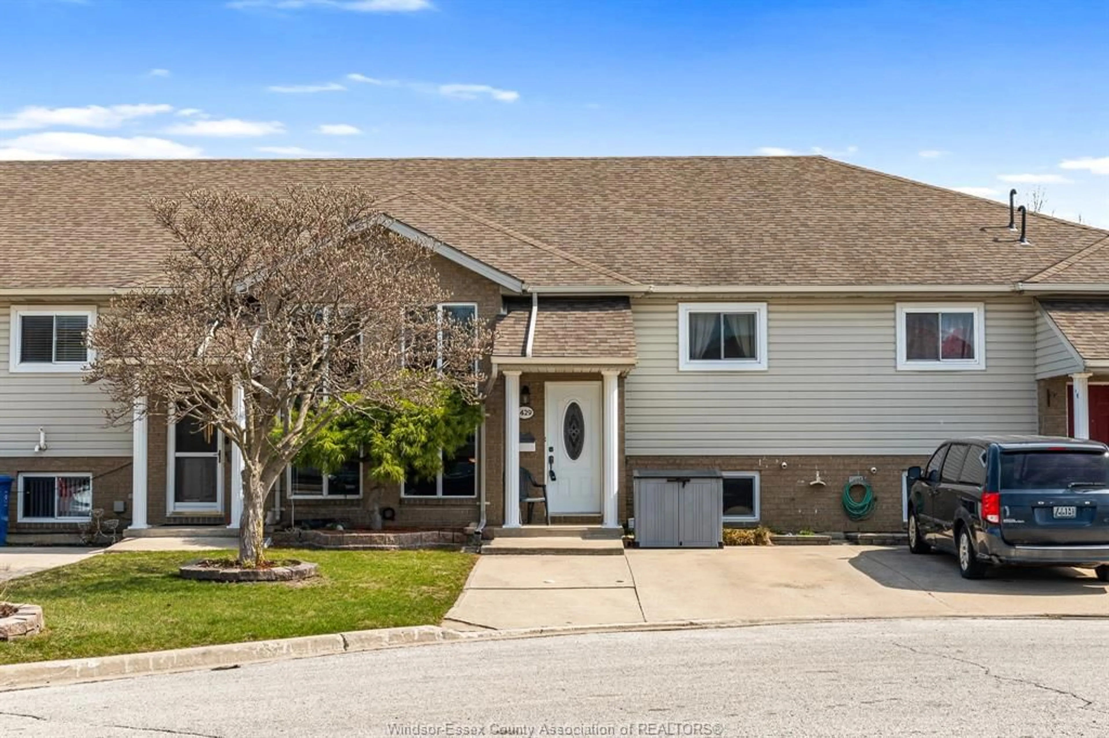 Home with vinyl exterior material, street for 1429 MICKAILA Cres, Tecumseh Ontario N8N 4Z2