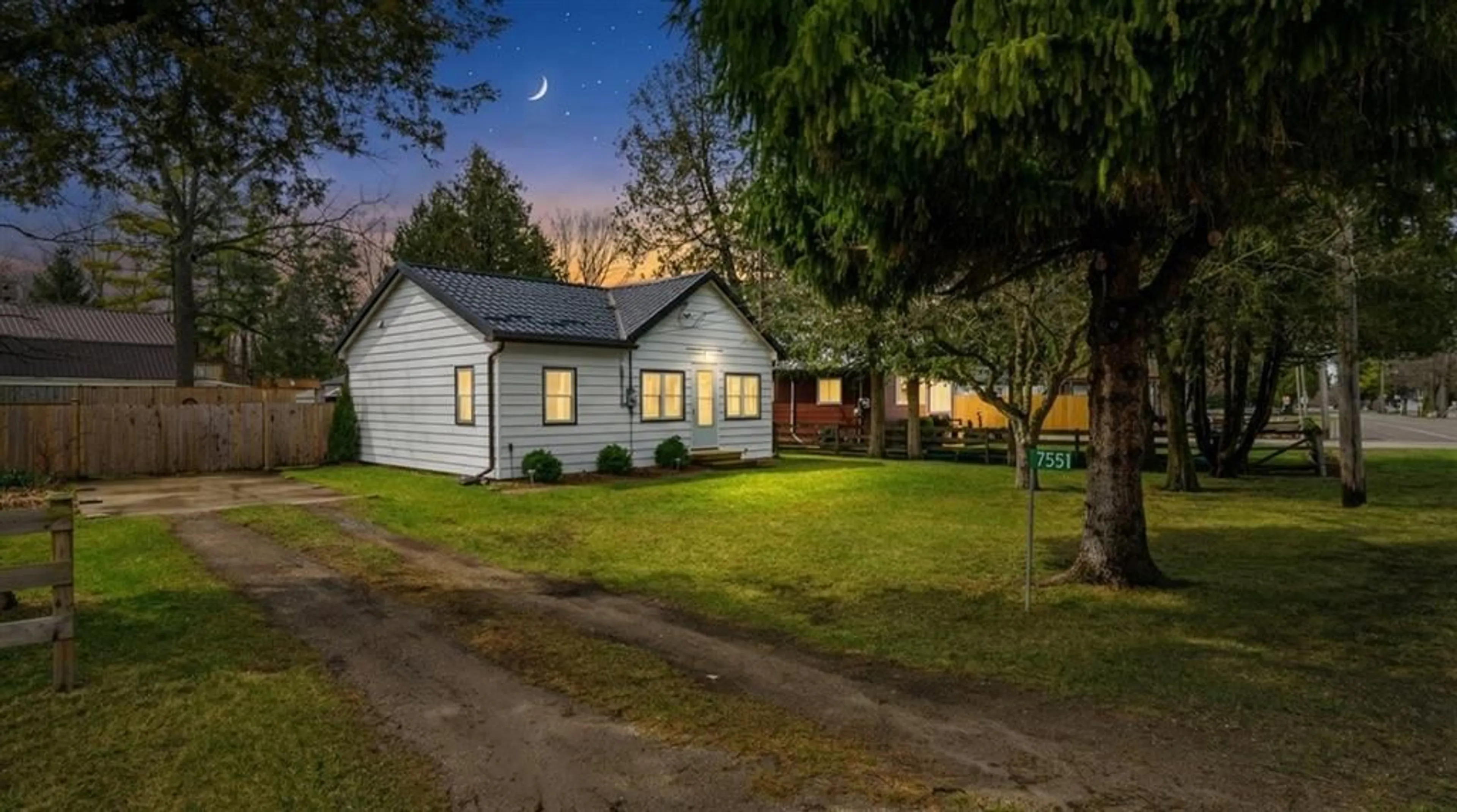 A pic from outside/outdoor area/front of a property/back of a property/a pic from drone, street for 7551 RIVERSIDE Dr, Lambton Shores Ontario N0M 2L0