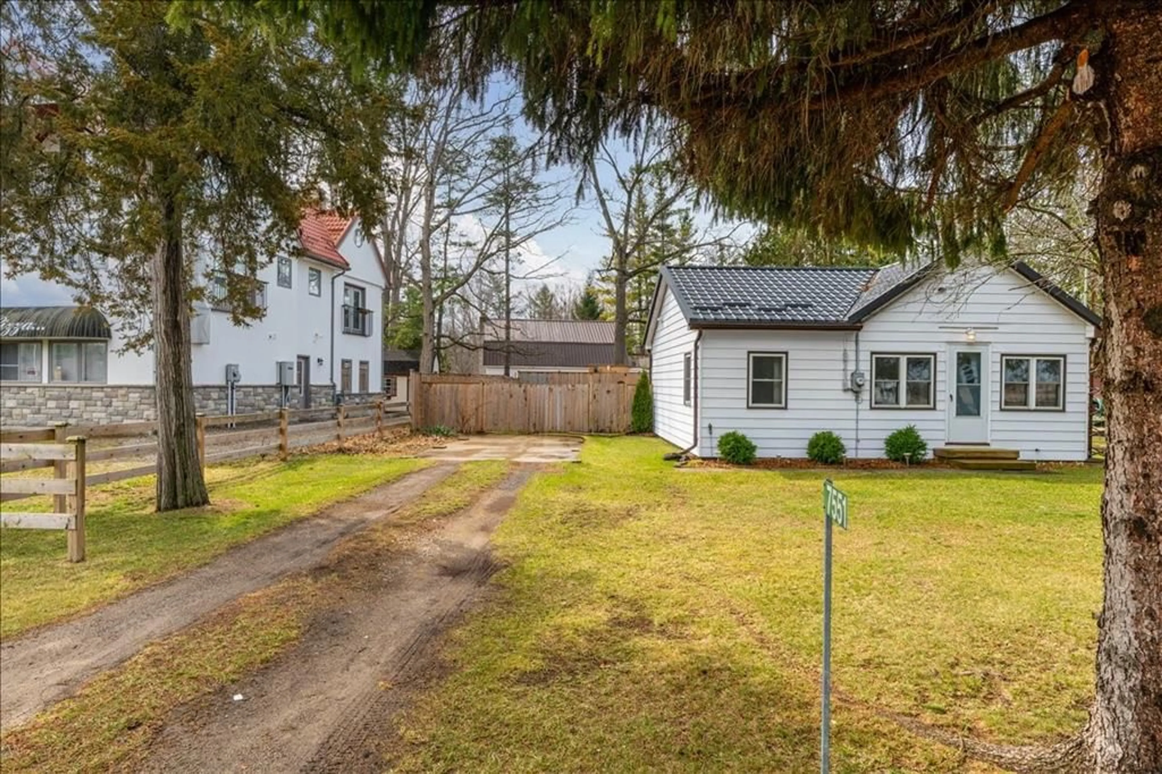 A pic from outside/outdoor area/front of a property/back of a property/a pic from drone, street for 7551 RIVERSIDE Dr, Lambton Shores Ontario N0M 2L0