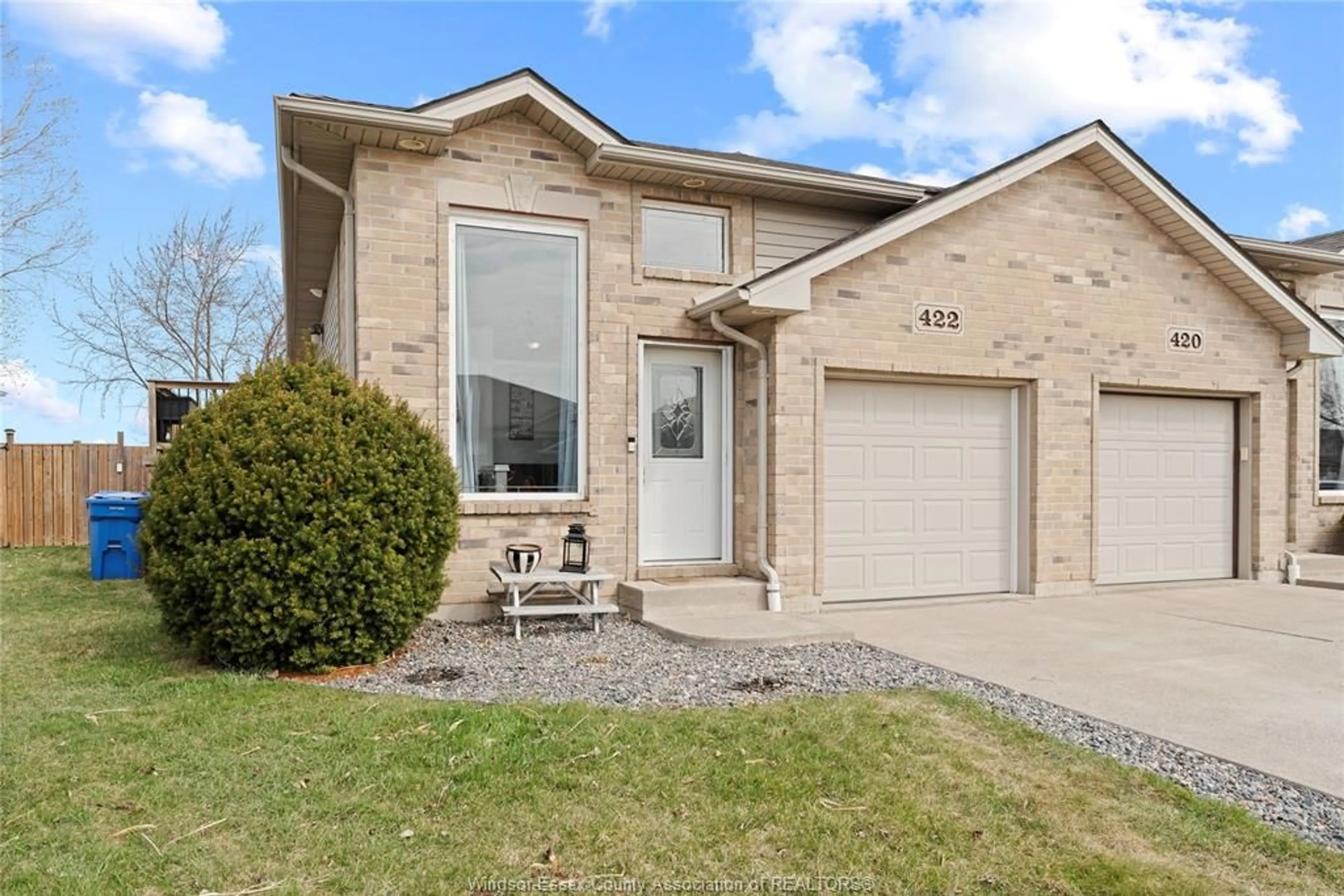 Home with brick exterior material, street for 422 ROSEWOOD Dr, Lakeshore Ontario N8L 1B9